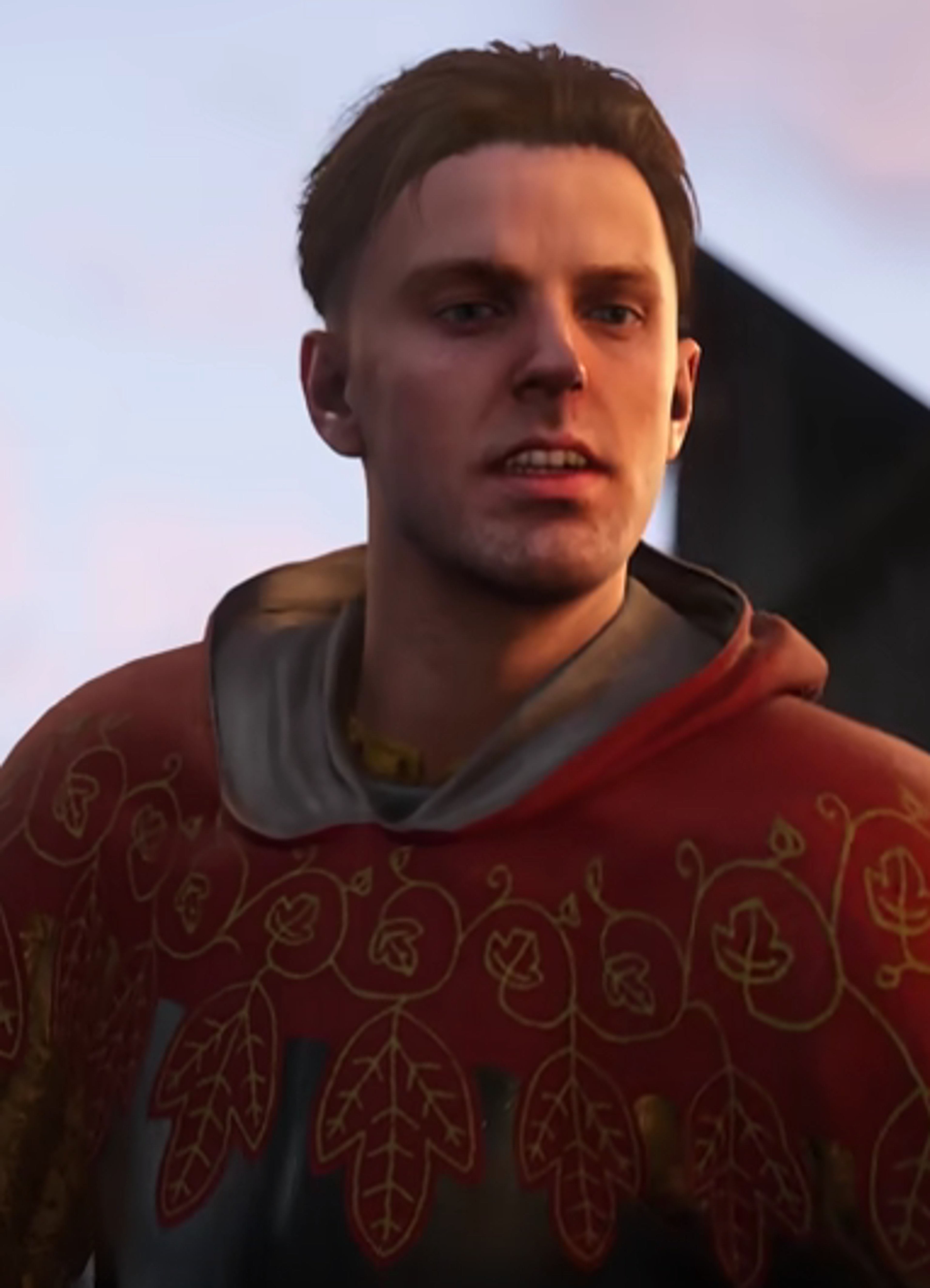 A young Bohemian nobleman with short brown hair wearing a red and gold patterned tunic or cloak