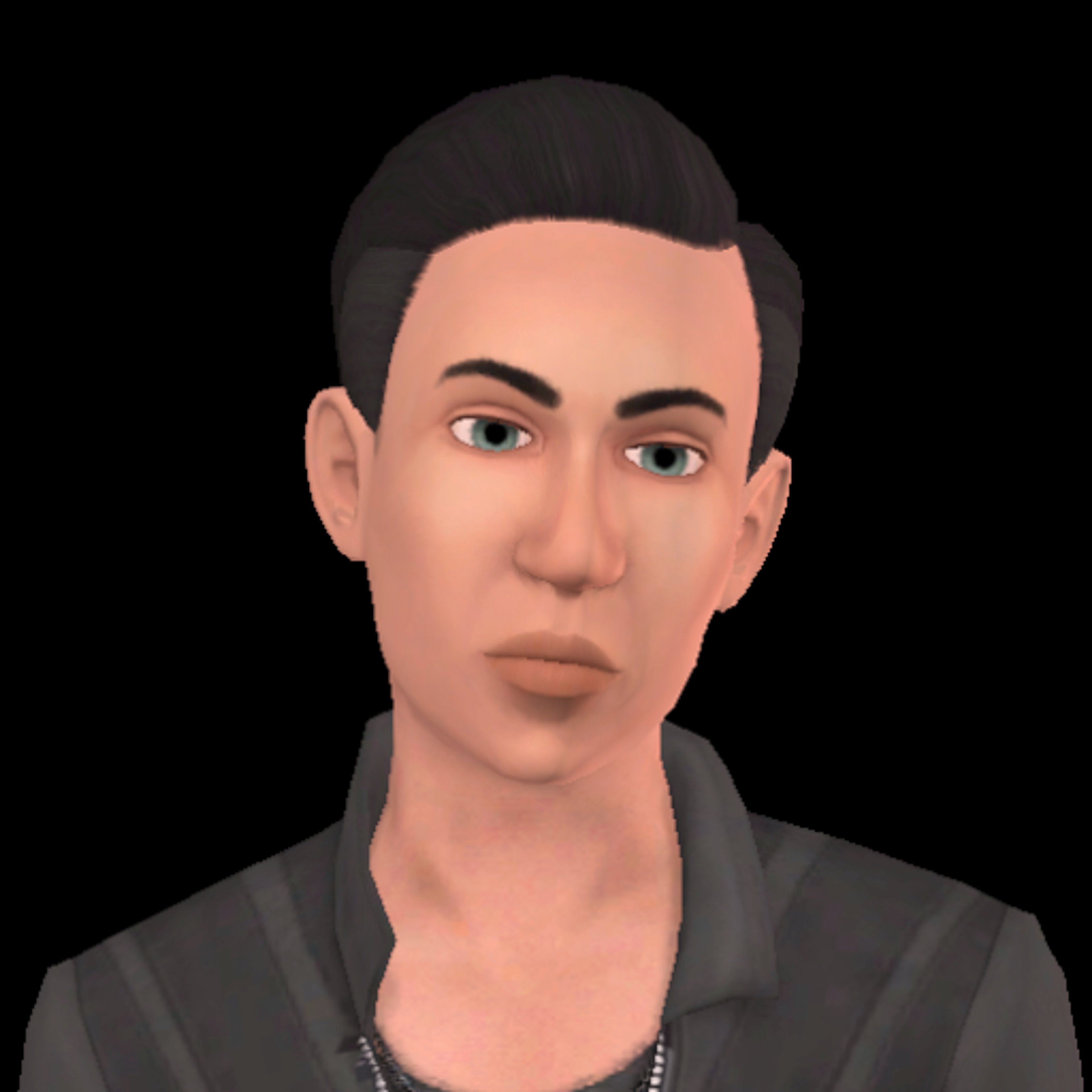 A young man with dark hair and green eyes wearing a gray shirt