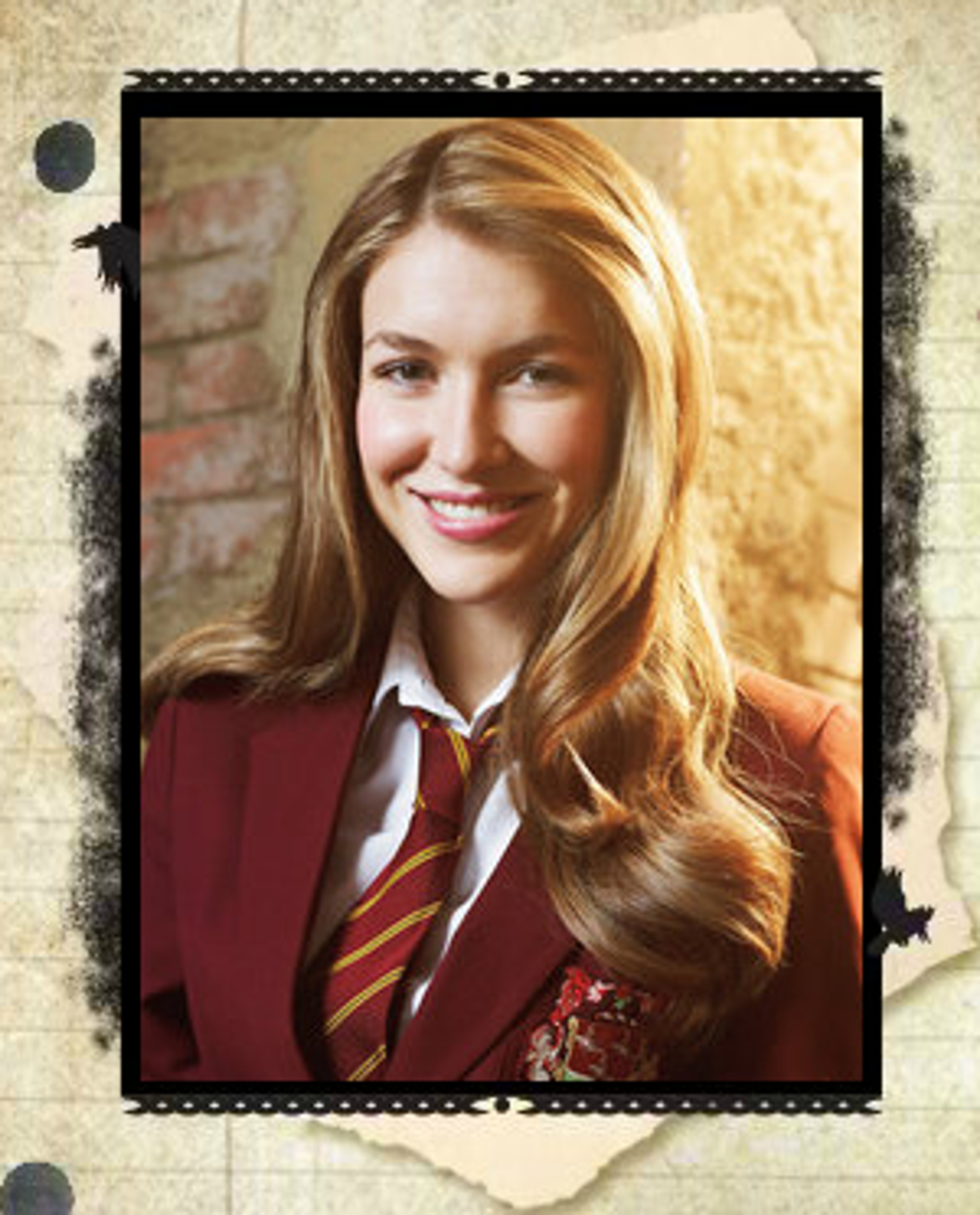 A young woman with long blonde hair wearing a red and gold school uniform, smiling at the camera.
