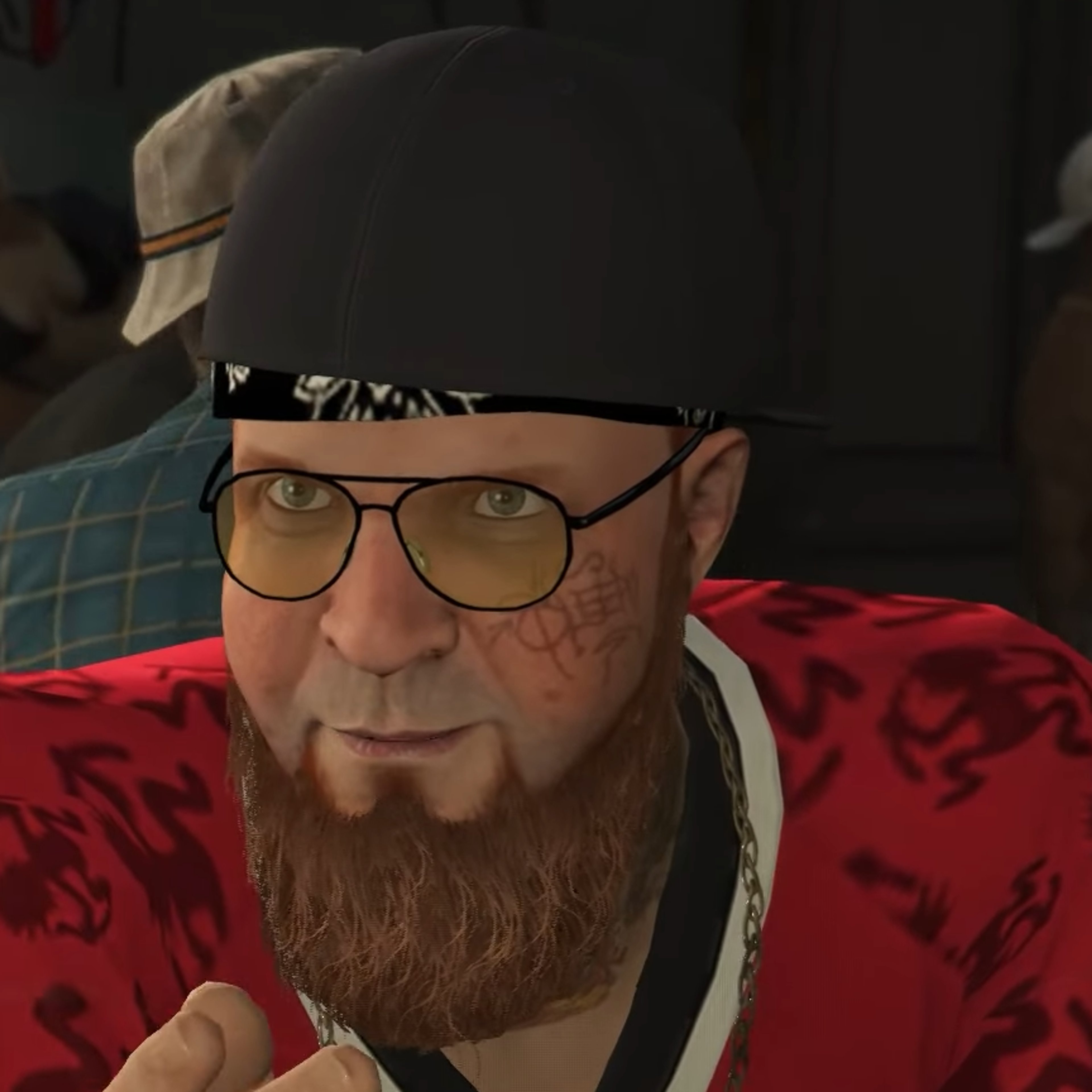 A middle-aged man with a long beard, glasses, and a red sports jersey with the number 69, who appears to be the leader of a drug manufacturing group.