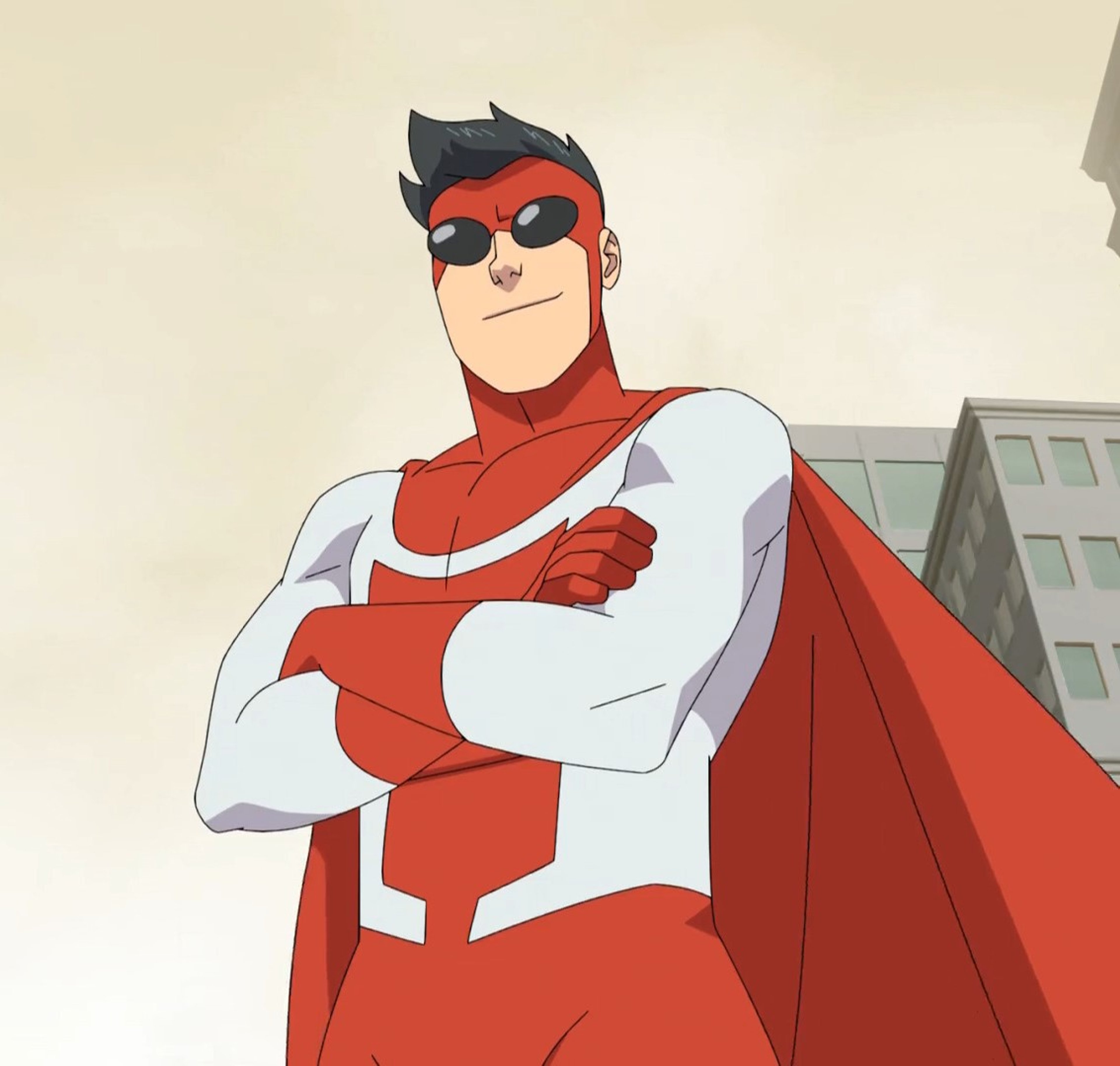 A superhero character in a red and white costume with a cape and goggles, standing with a confident and calculating expression.