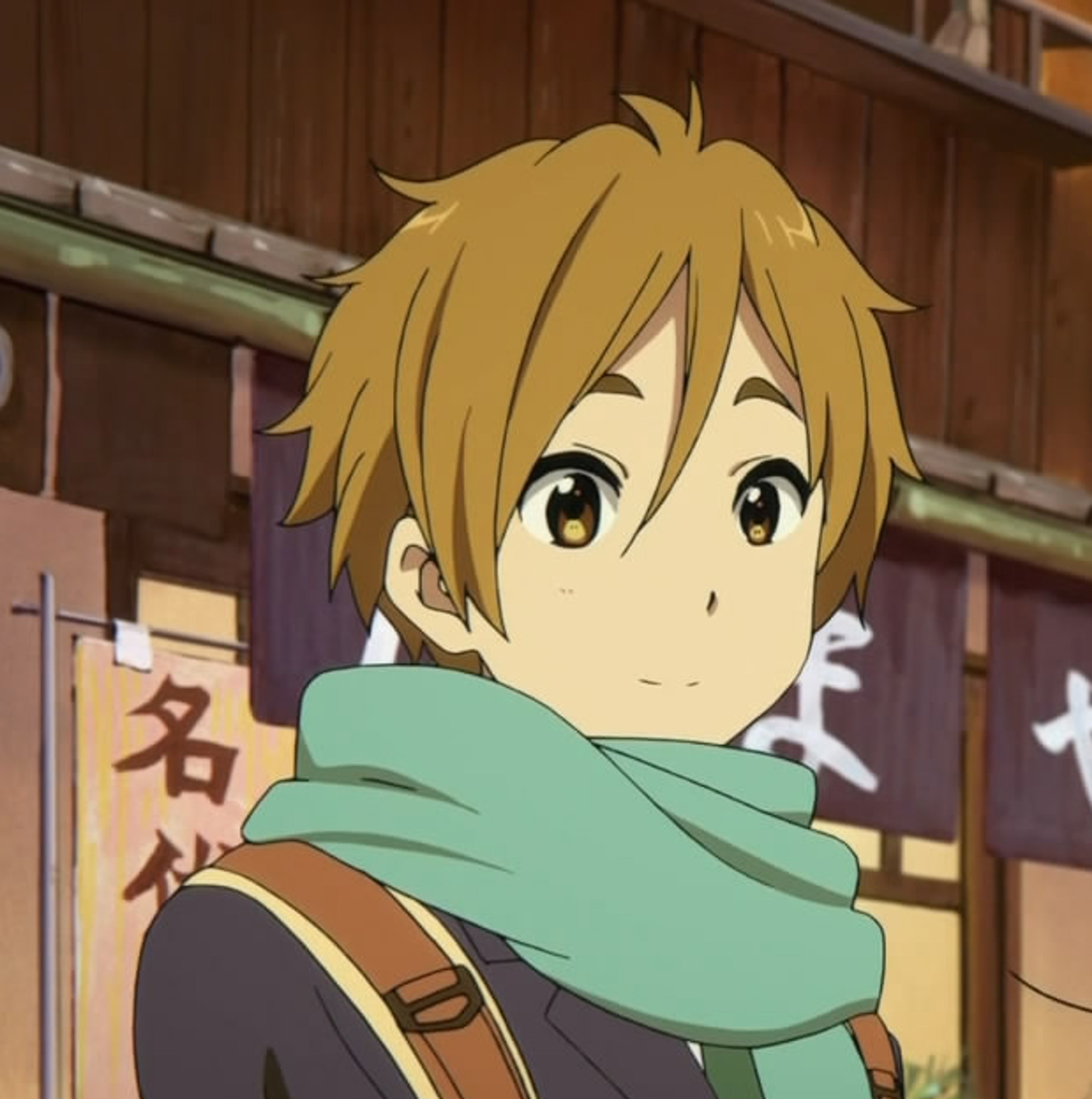 A shy, kind-looking teenage boy in a traditional Japanese setting