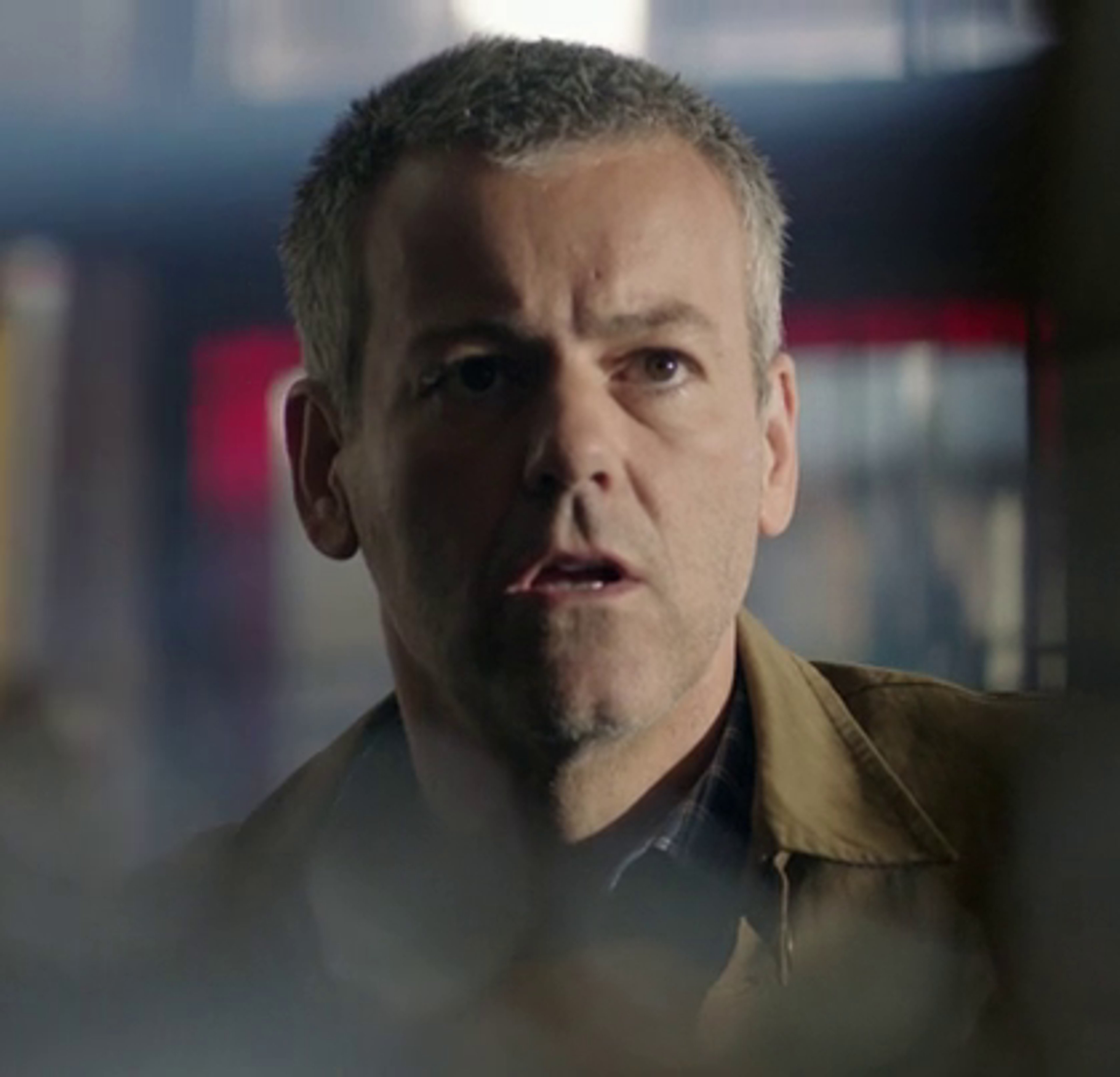 Detective Inspector Greg Lestrade, seasoned Scotland Yard officer