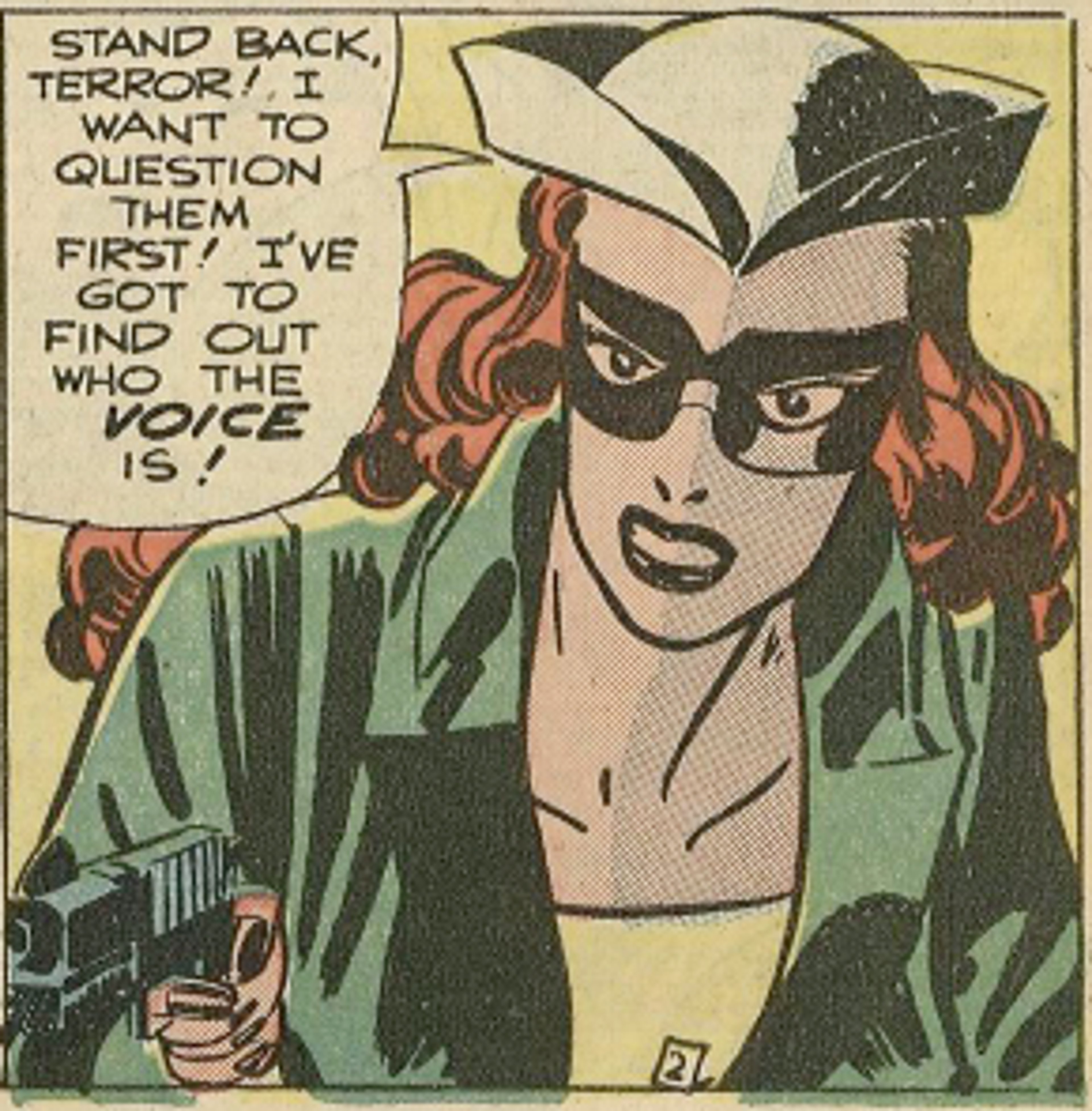 A woman in a green jacket and sunglasses holding a gun with a determined expression