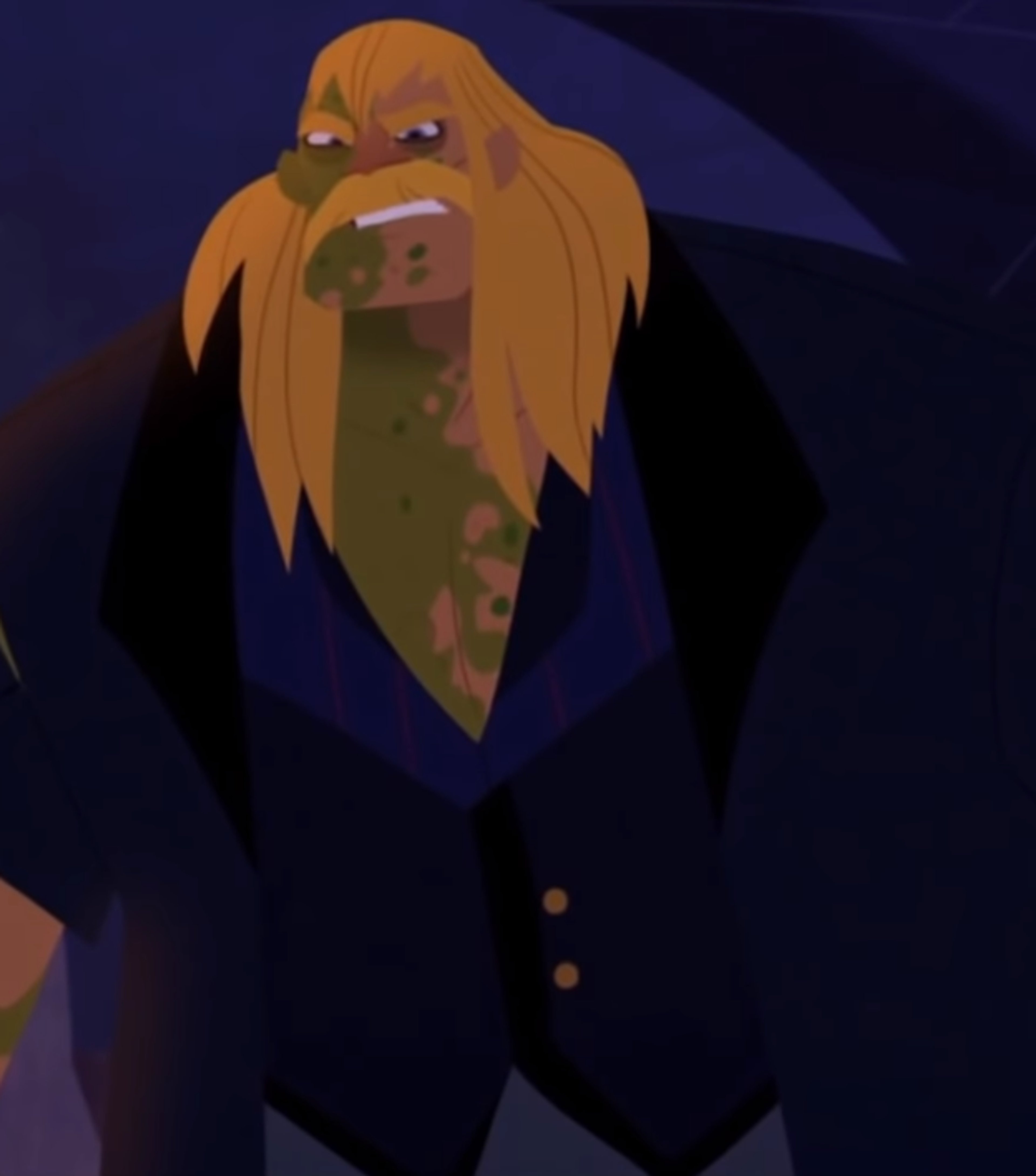 An elderly man with gray hair and a goatee, dressed in a suit, with a stern expression on his face.