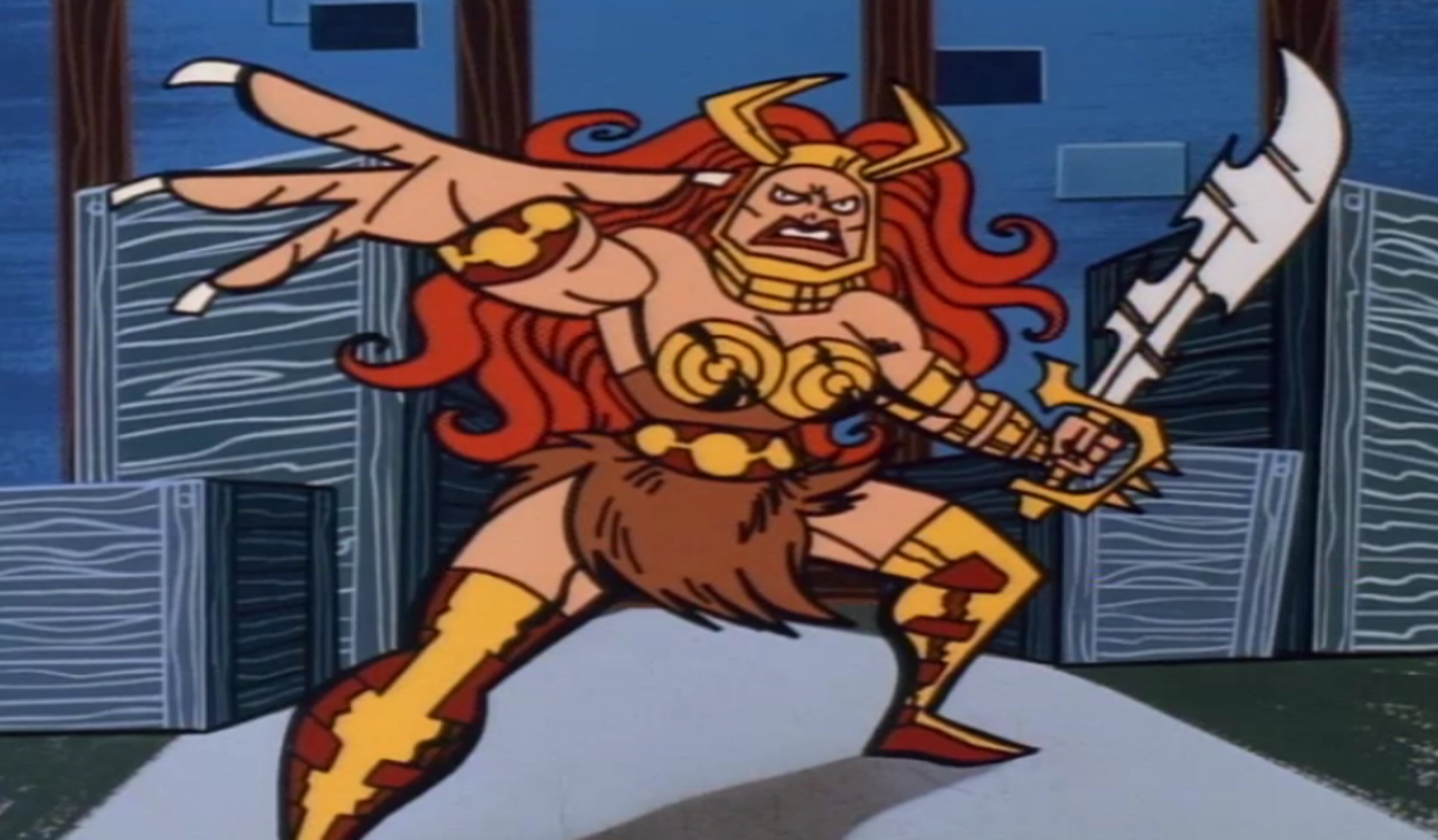 A muscular, red-haired female warrior character in fur clothing and golden armor, wielding a weapon in a fighting stance.