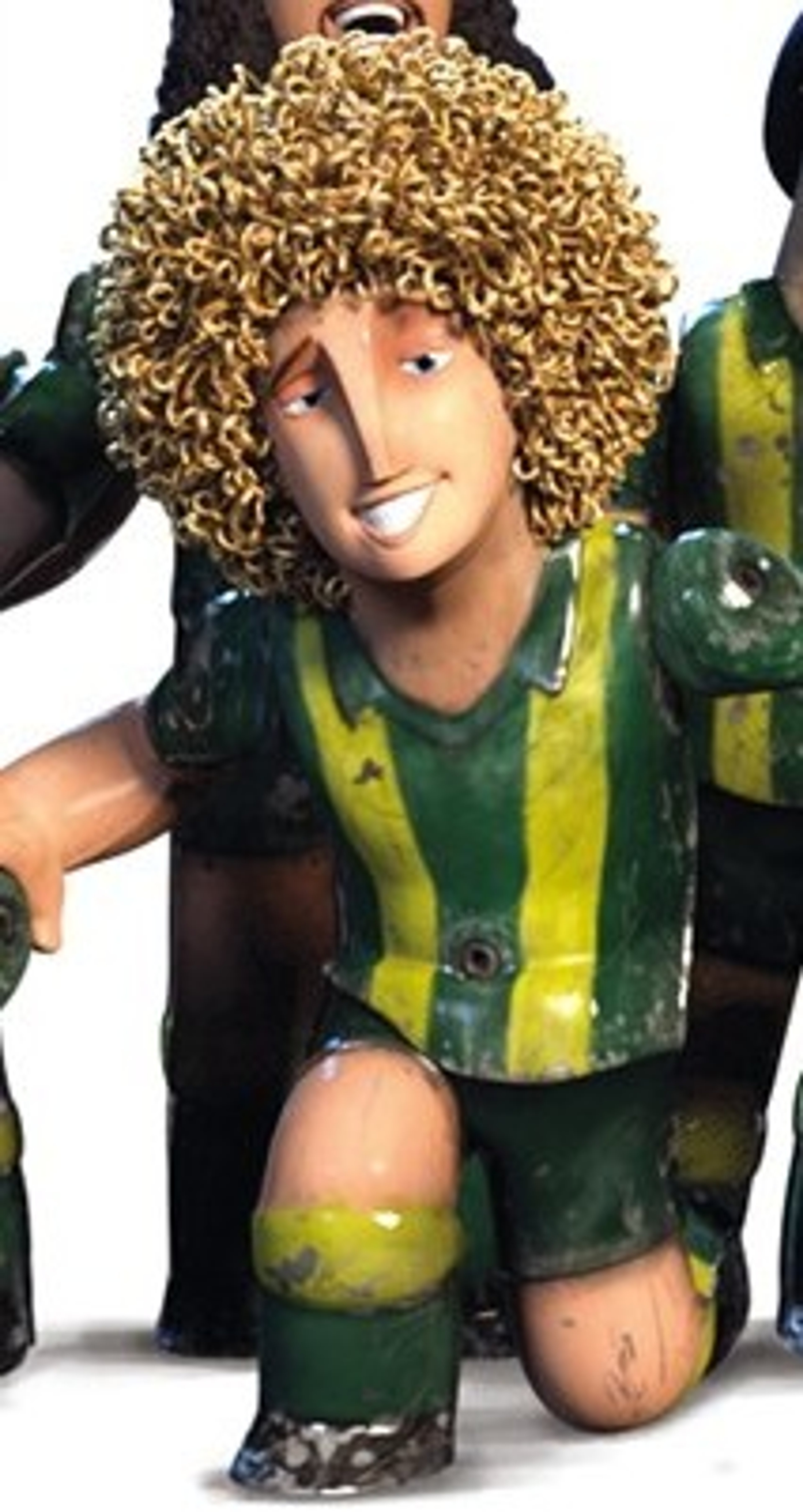 A cartoon character of a young man with curly blond hair wearing a green and yellow striped uniform, smiling and appearing to be a foosball player.