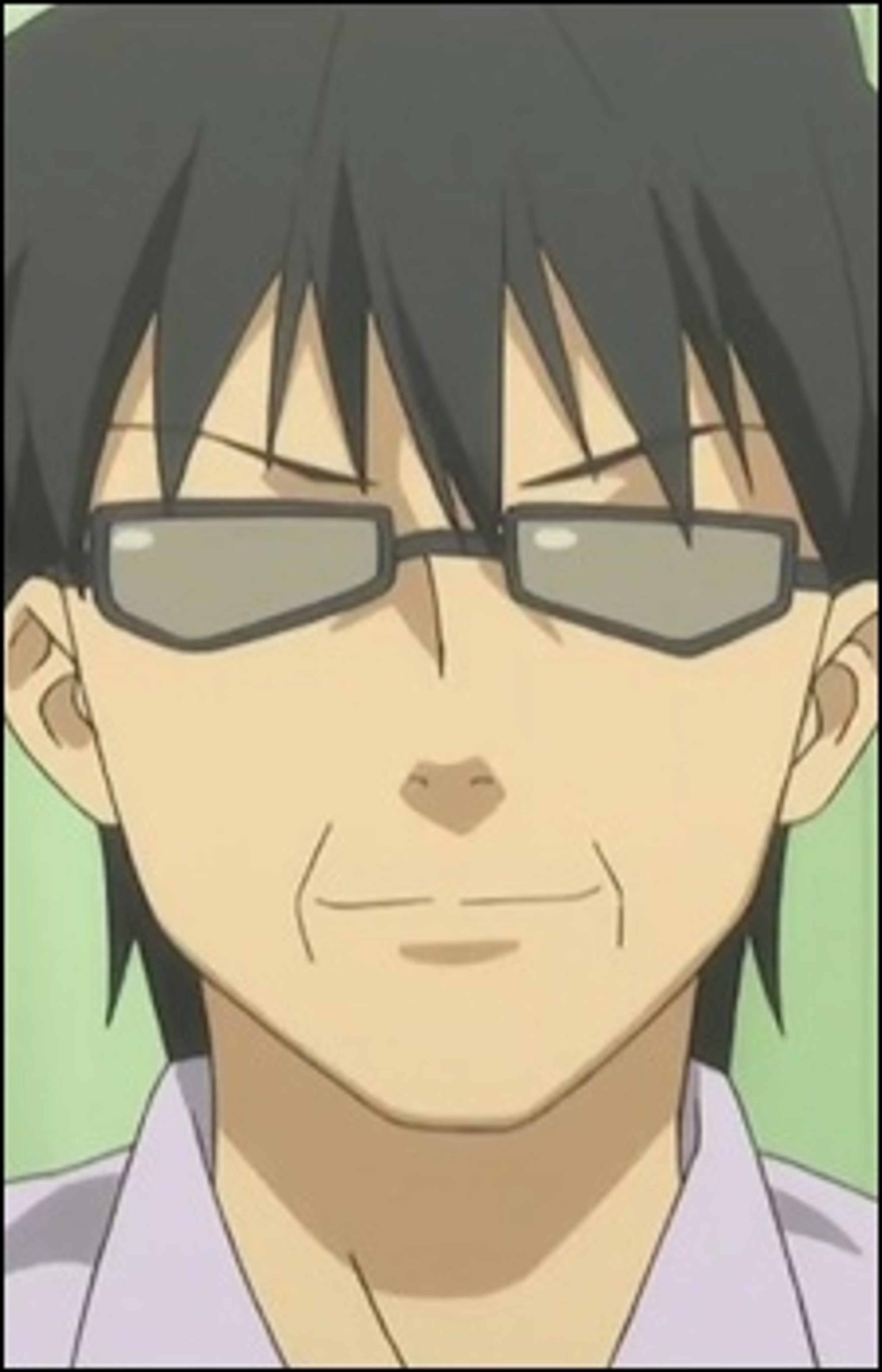 A middle-aged man with short, spiky dark hair and glasses