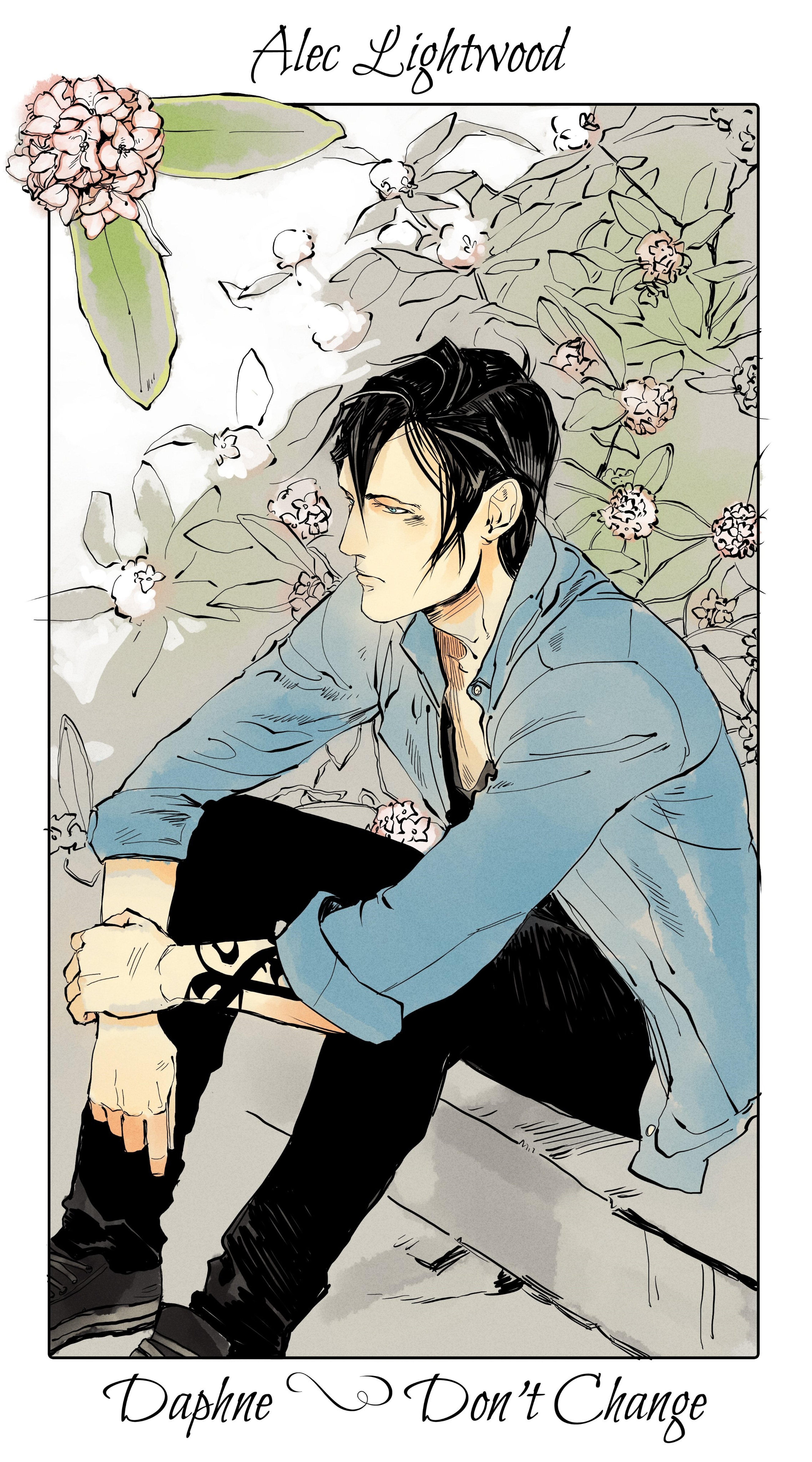 A young man with dark hair sitting in a garden setting
