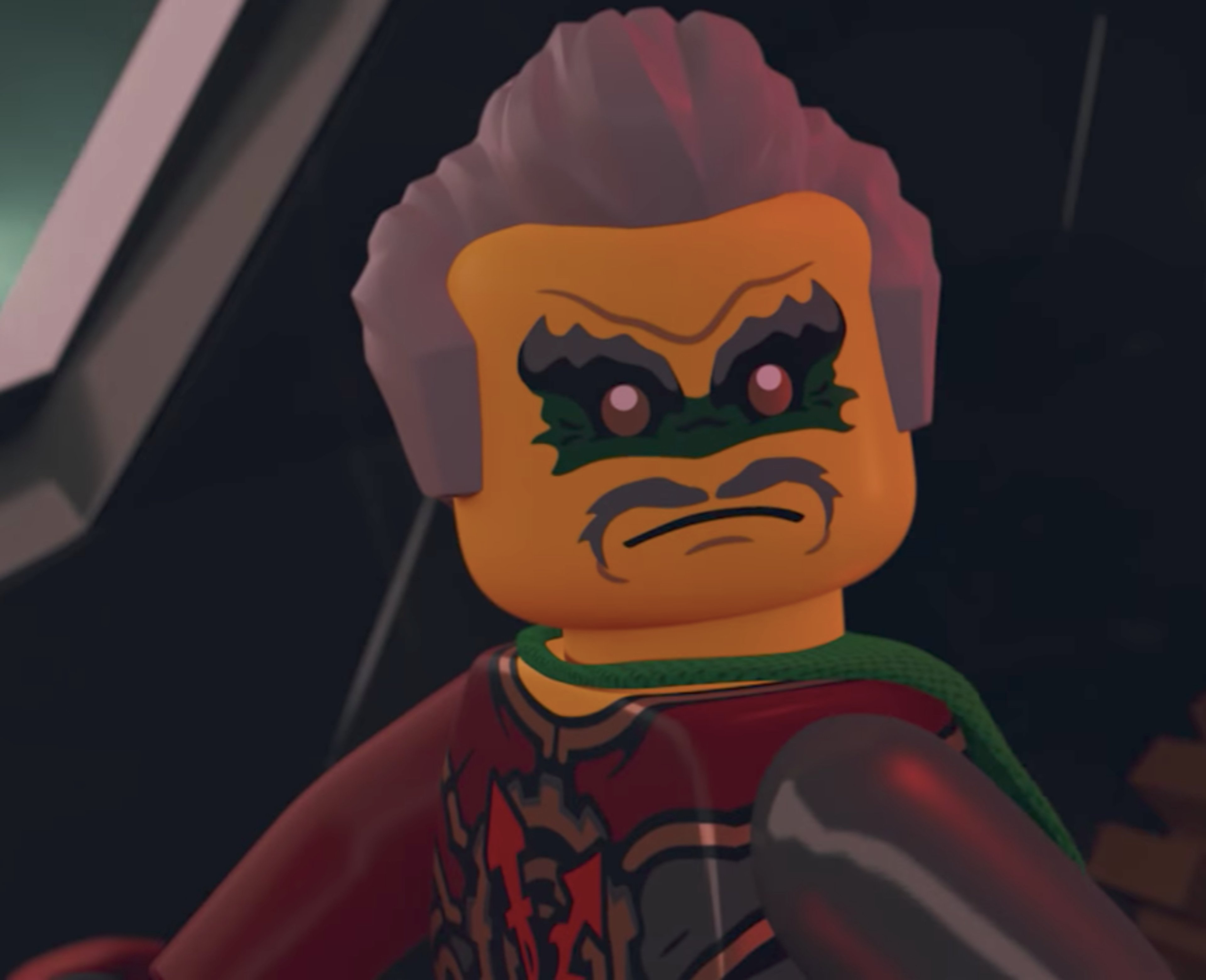 A LEGO minifigure character with gray hair, a mustache, and a green facial tattoo, wearing red and gray armor with gold detailing.