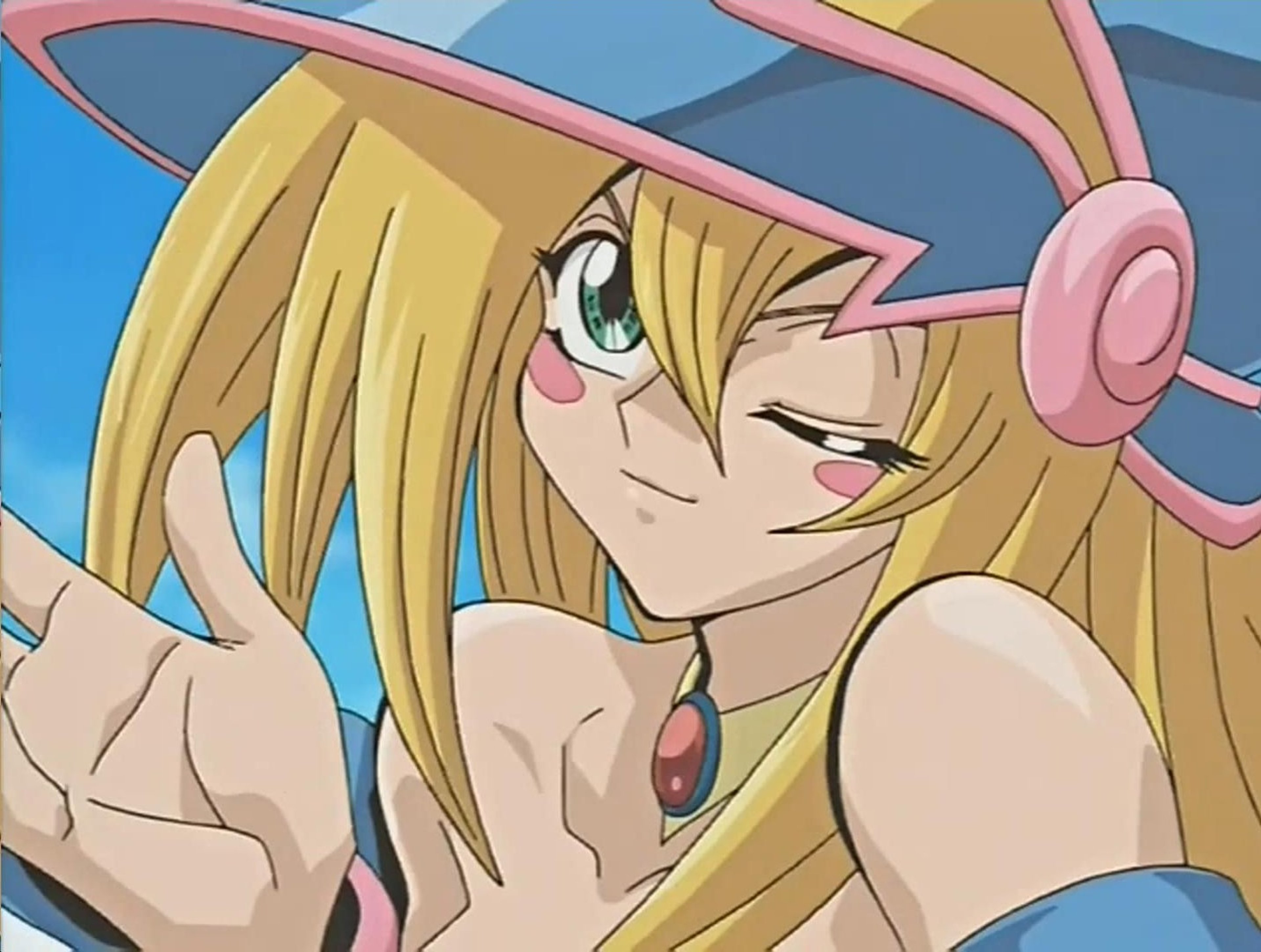 An anime-style character with blonde hair and green eyes, wearing a blue and pink magician's outfit.