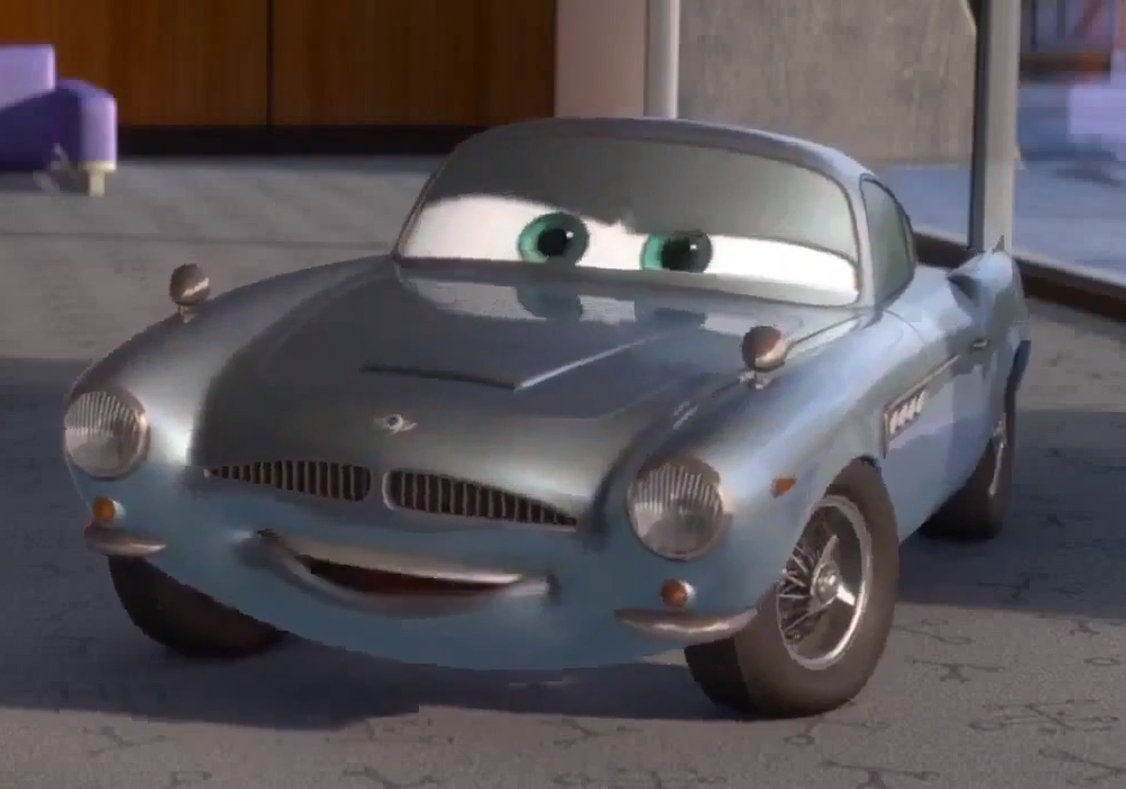 A detailed, animated car character with a sleek, silver-gray body and large, expressive eyes.
