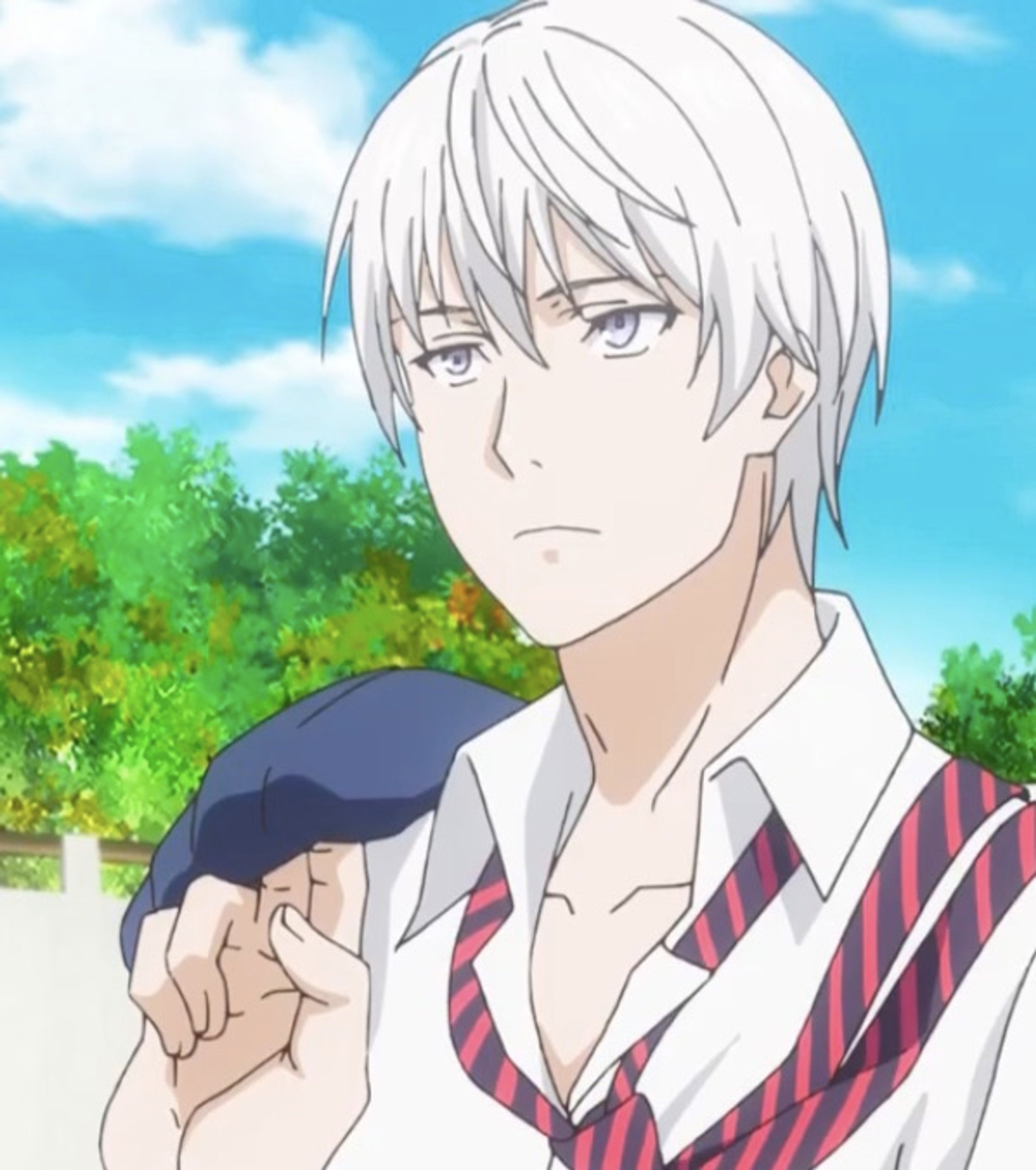 A young man with silver-white hair wearing a school uniform