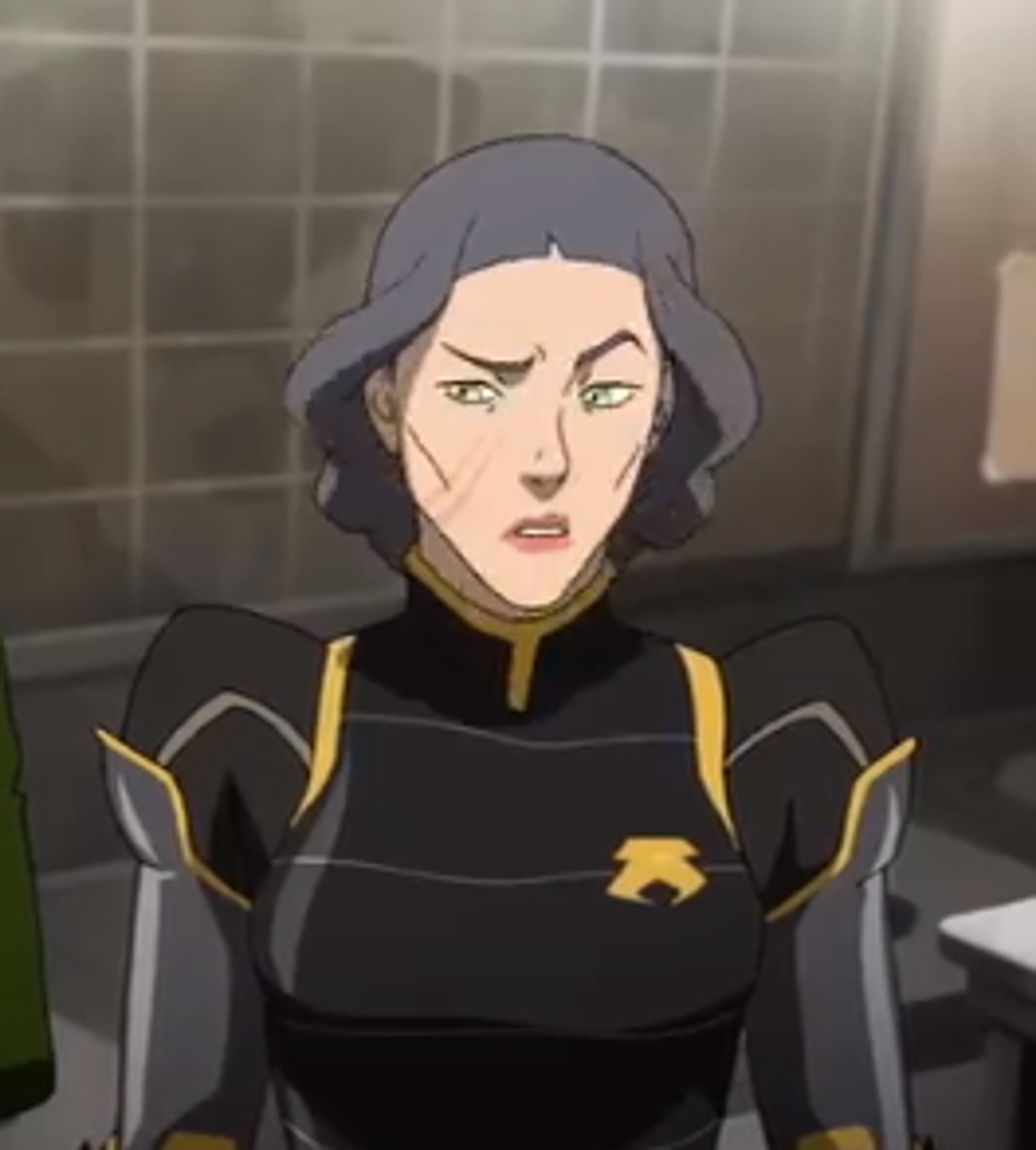 A woman in a police or military uniform with a stern expression