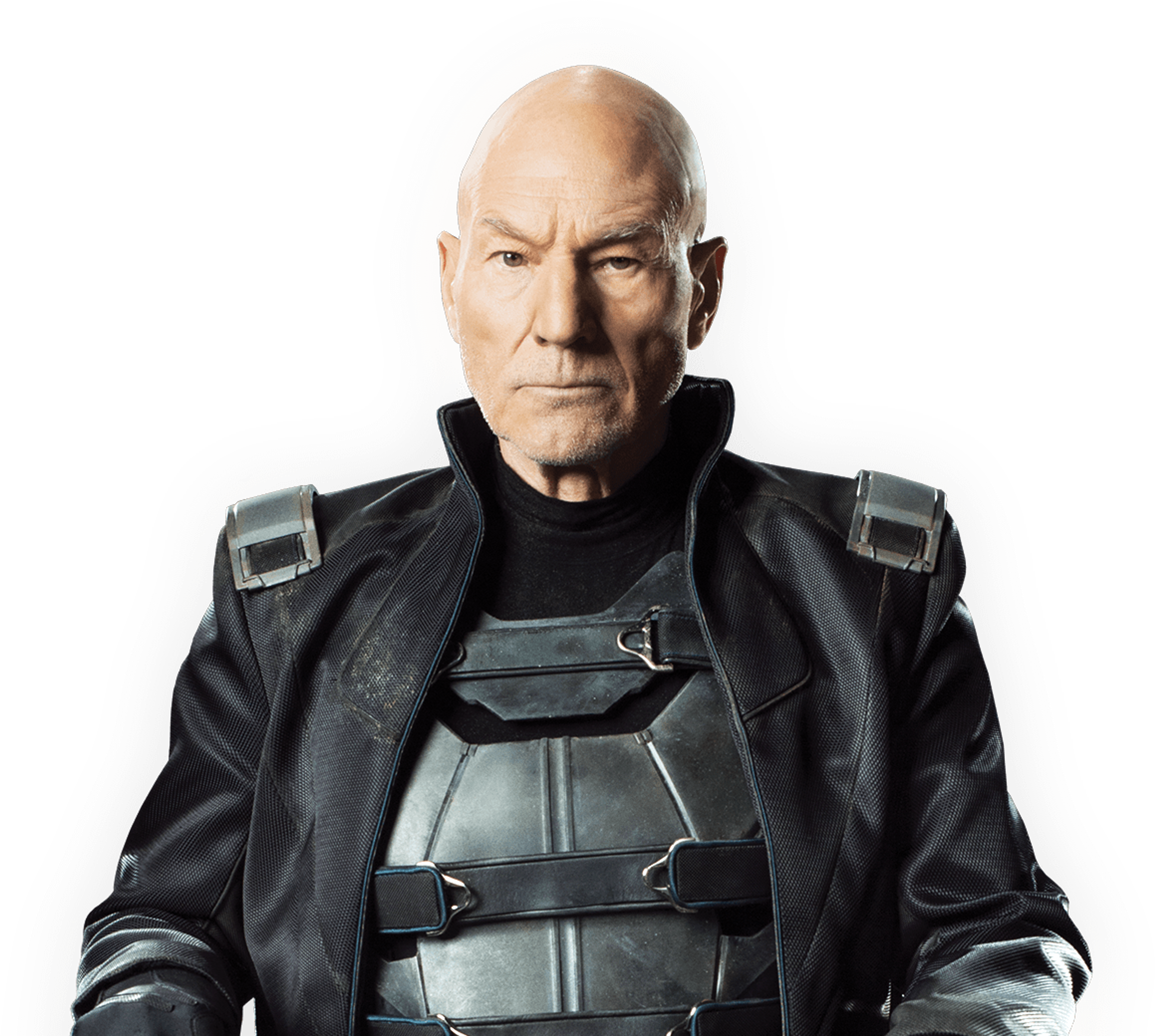 An older bald man in a wheelchair wearing a black suit and tie