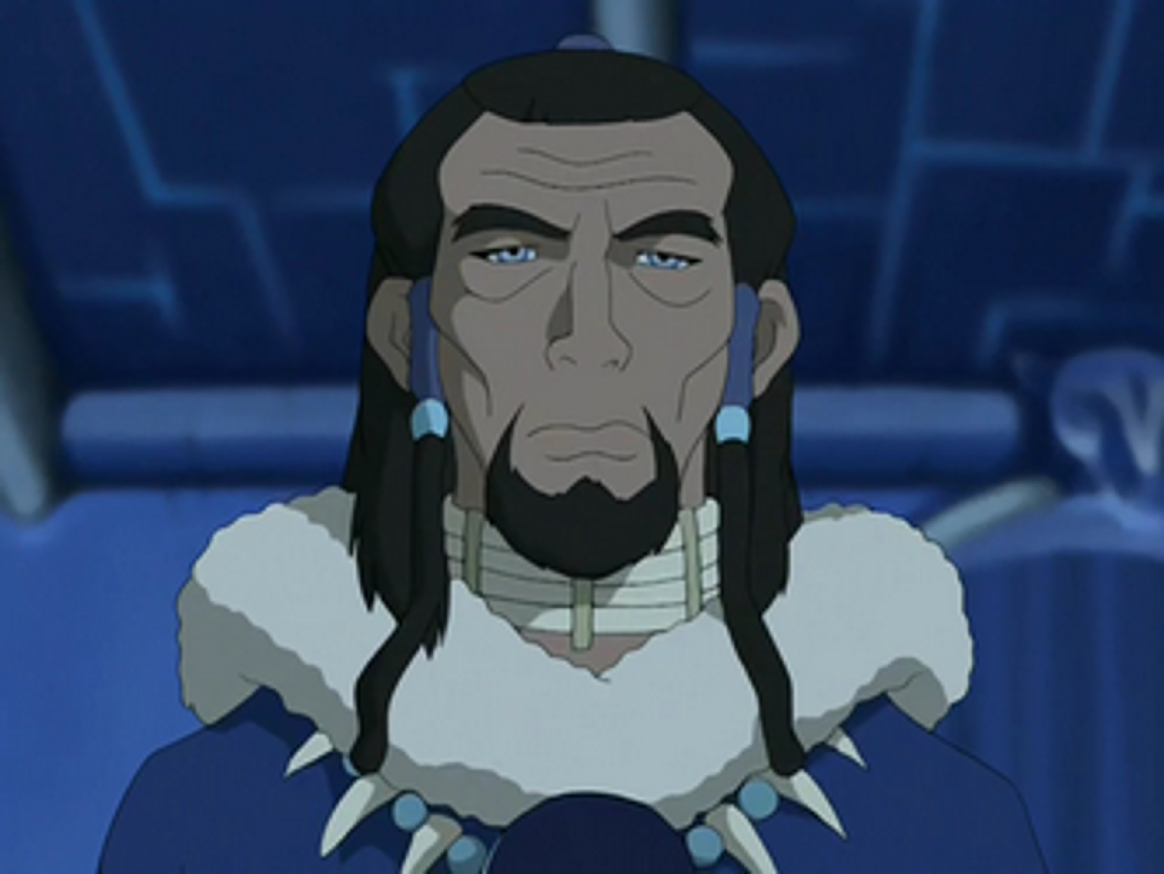 A middle-aged man with braided hair wearing traditional Northern Water Tribe clothing