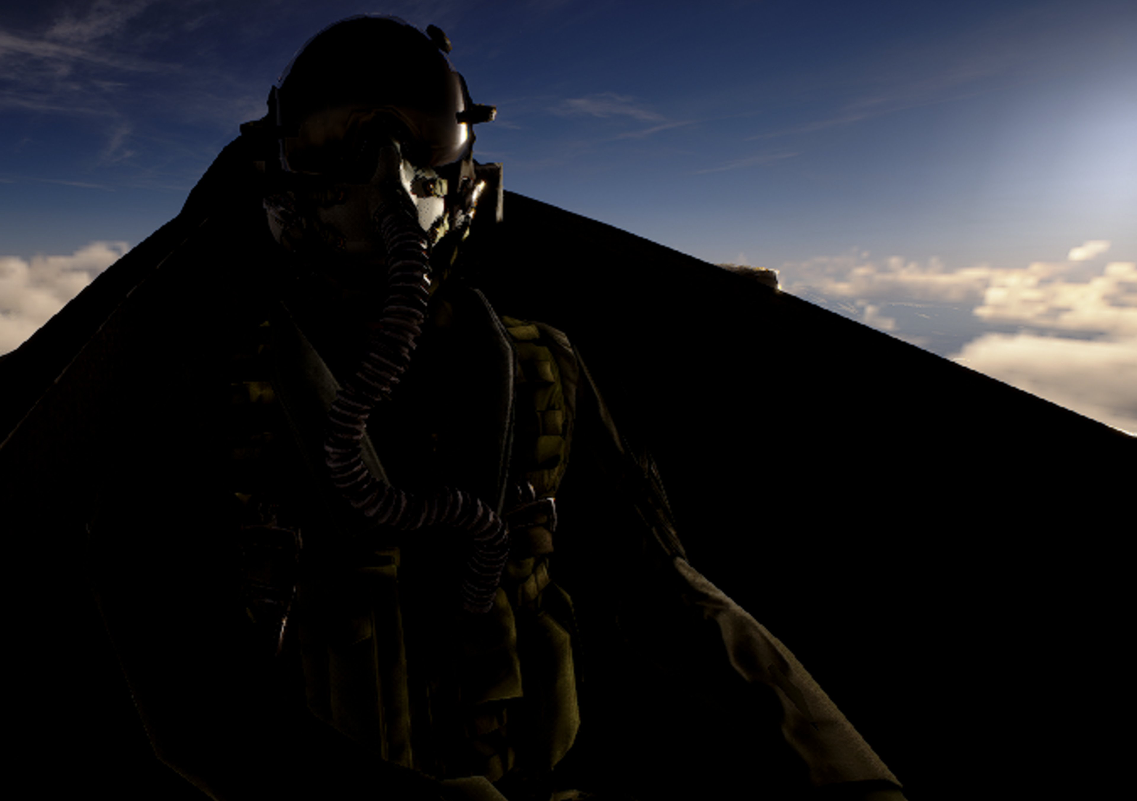 A silhouetted military figure standing in front of a mountainous landscape at sunset.