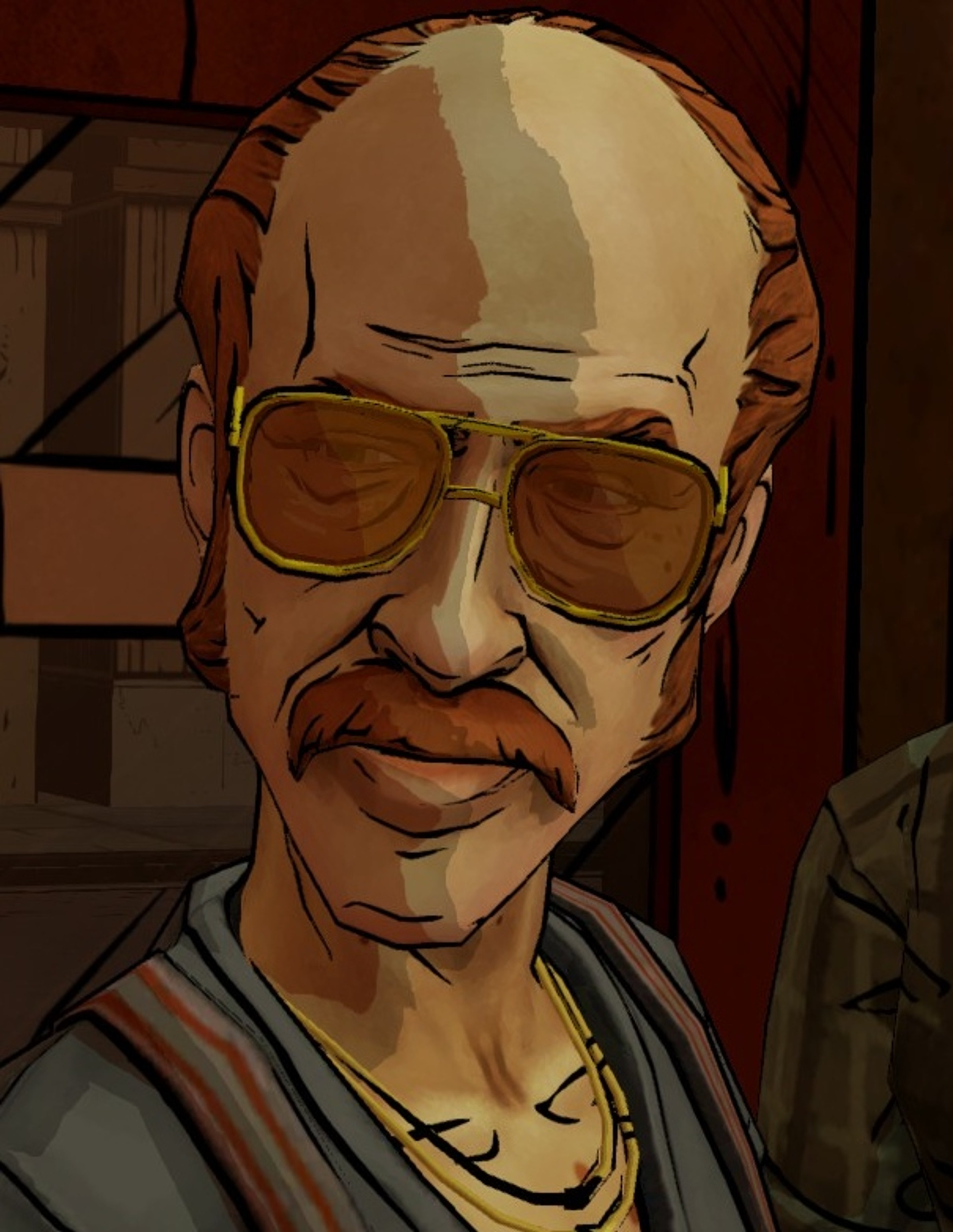 A tough-looking, bald man with a mustache and beard wearing glasses and a striped shirt or jacket
