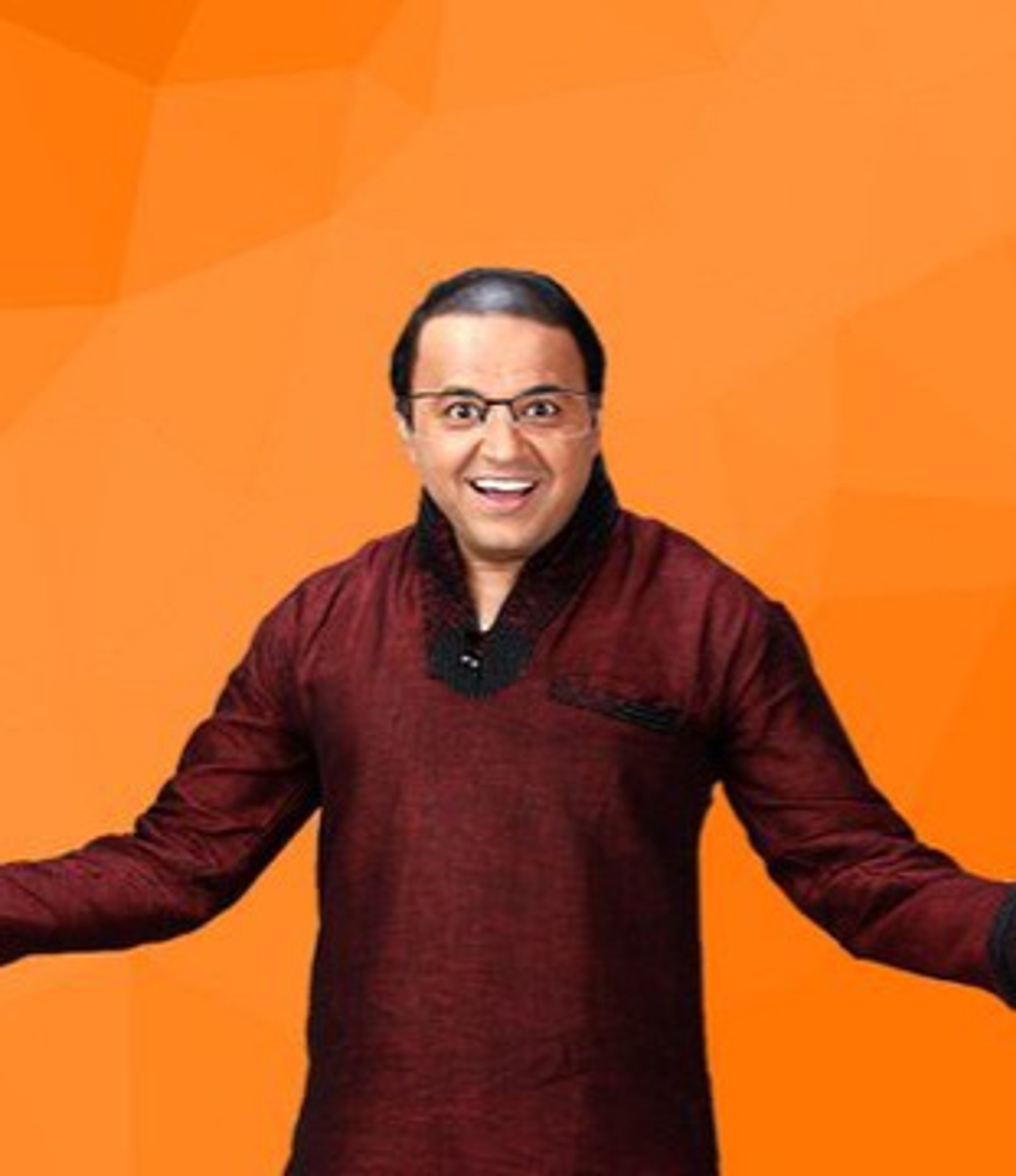 A smiling middle-aged man wearing a maroon shirt standing in front of an orange background