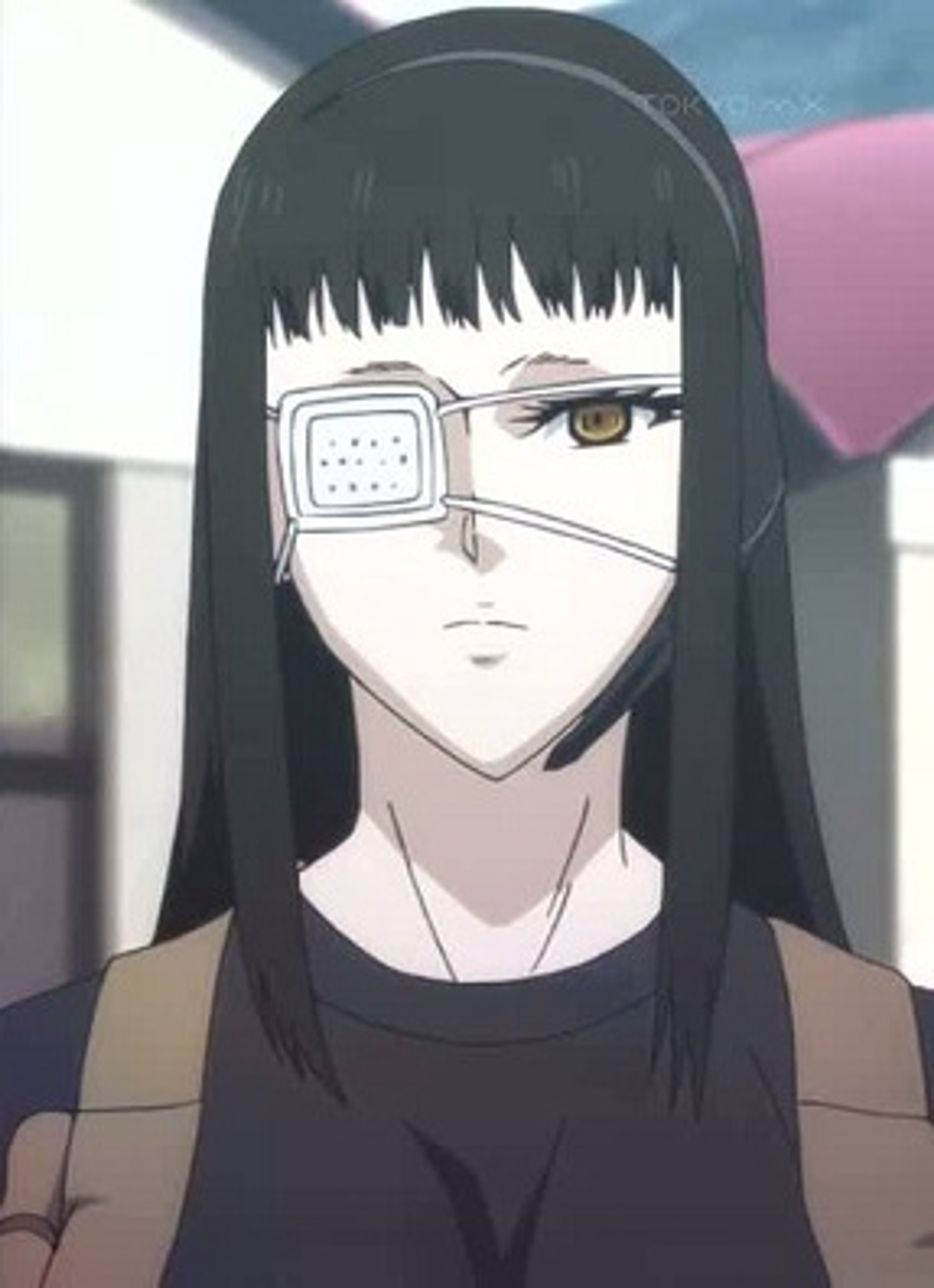 A woman with an eye patch wearing a military uniform