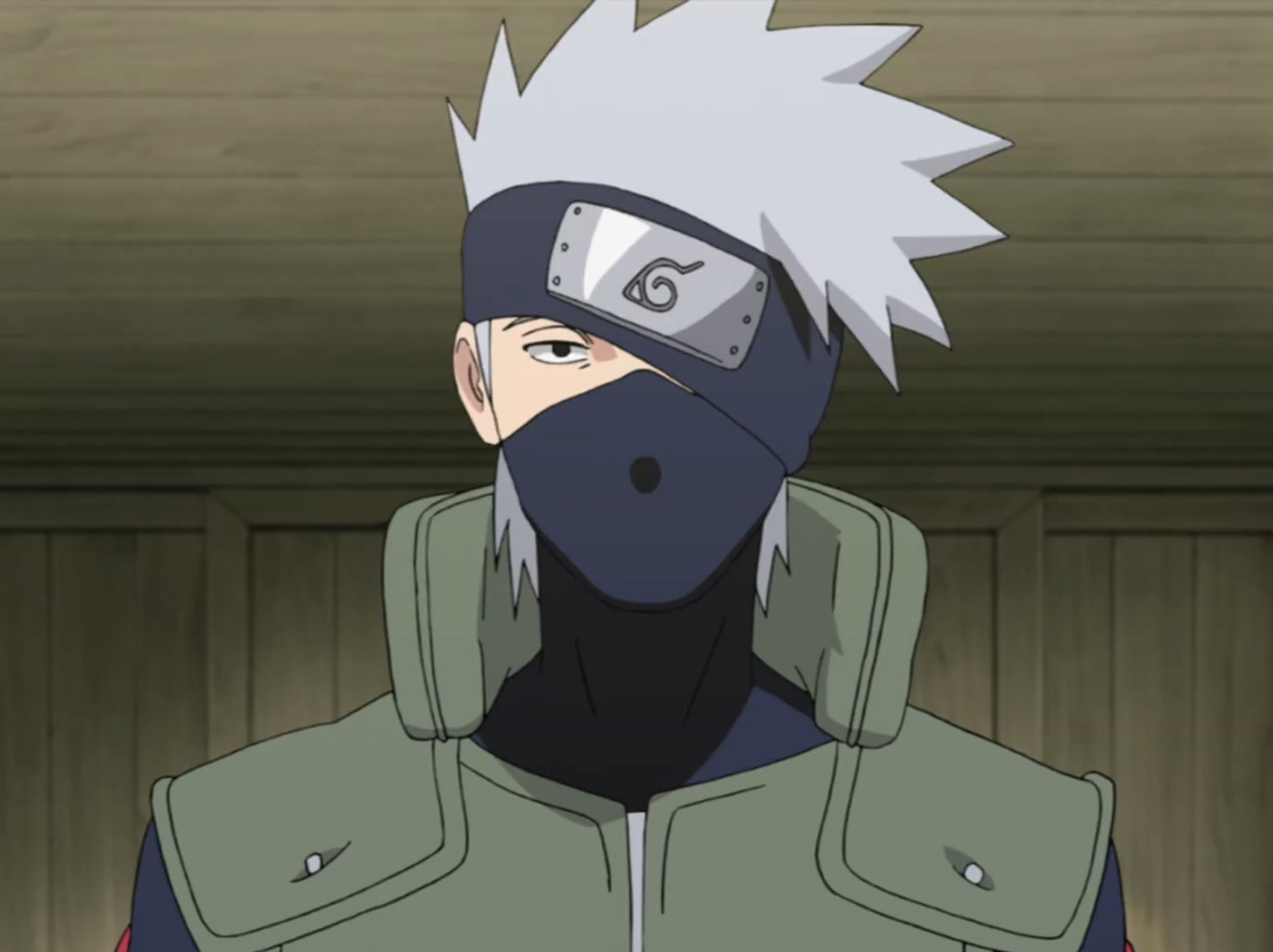 An anime character with white spiky hair, a dark mask, and a green vest, appearing to be a ninja from the Naruto series.