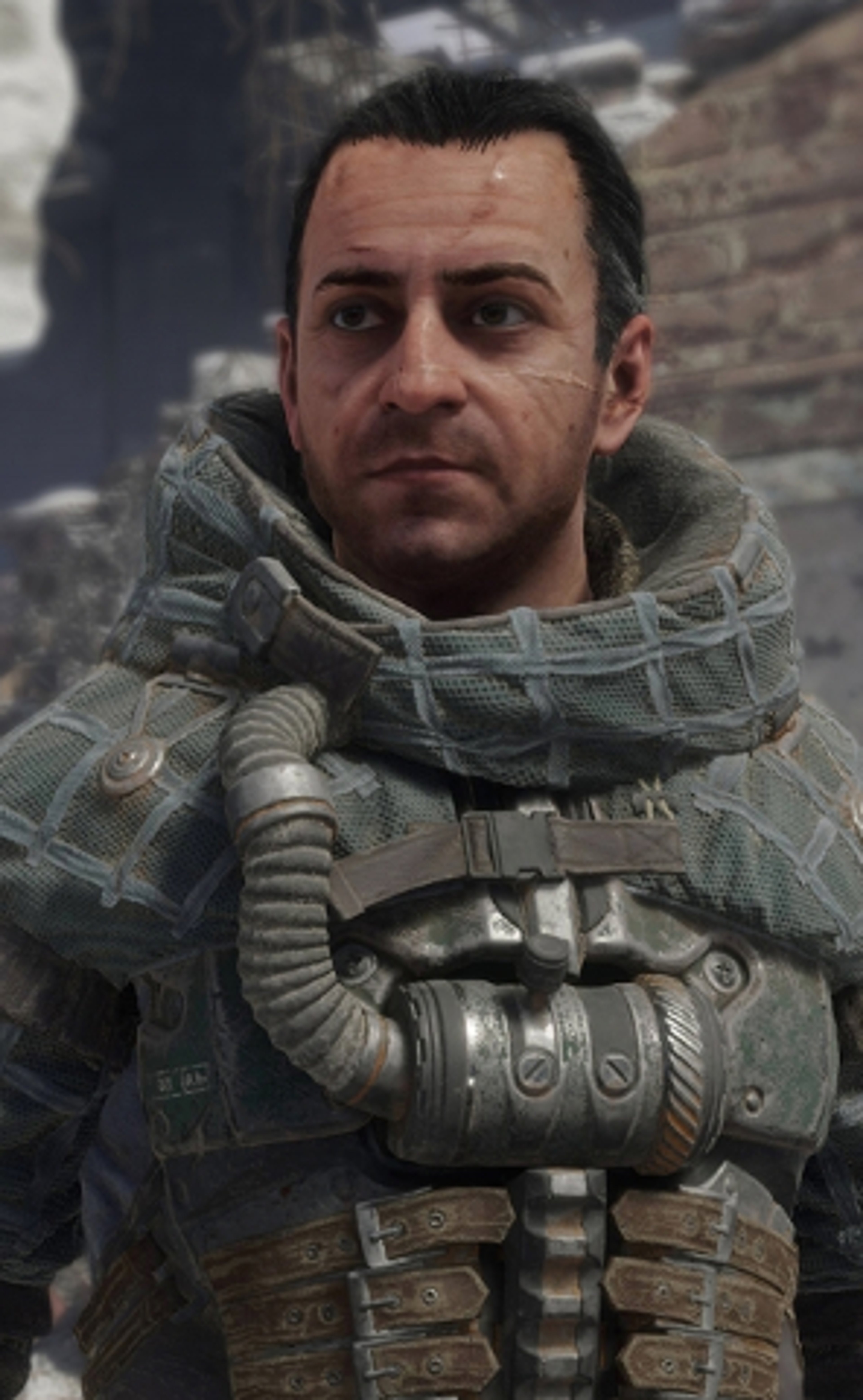 A middle-aged man with graying hair wearing a military-style jacket and scarf in a post-apocalyptic setting