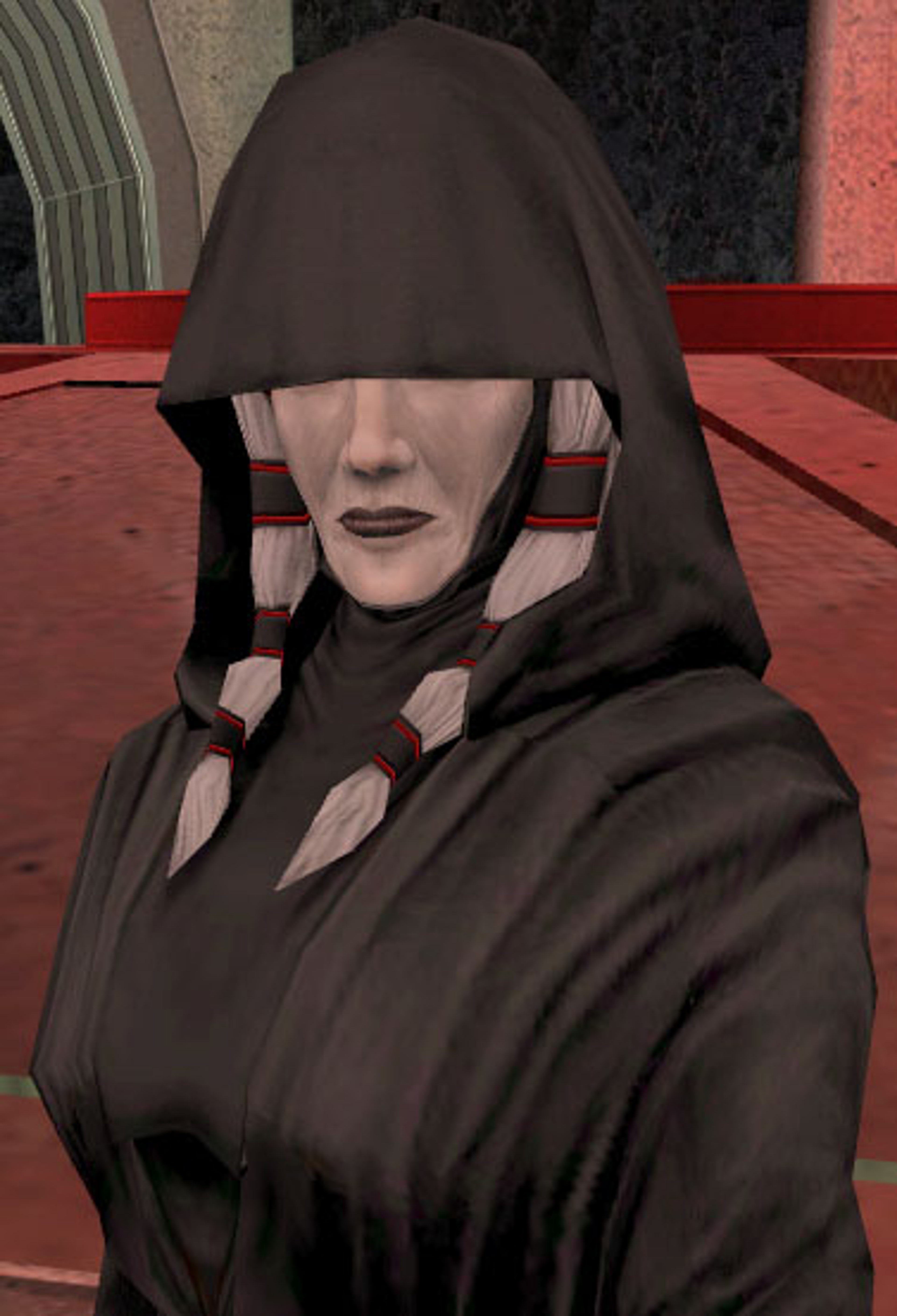 A hooded figure in dark robes with a serious expression