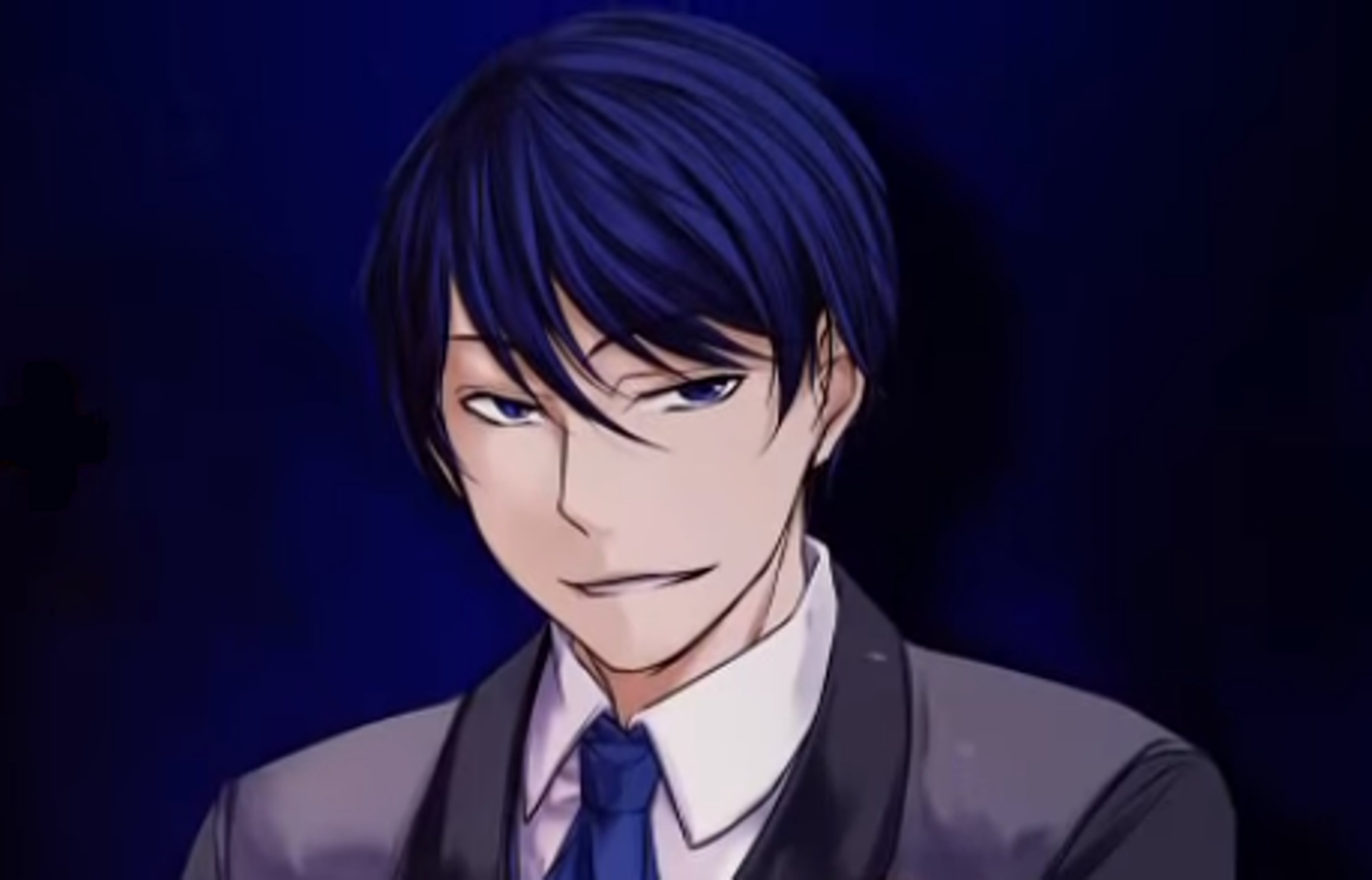 A serious-looking young man in a suit and tie