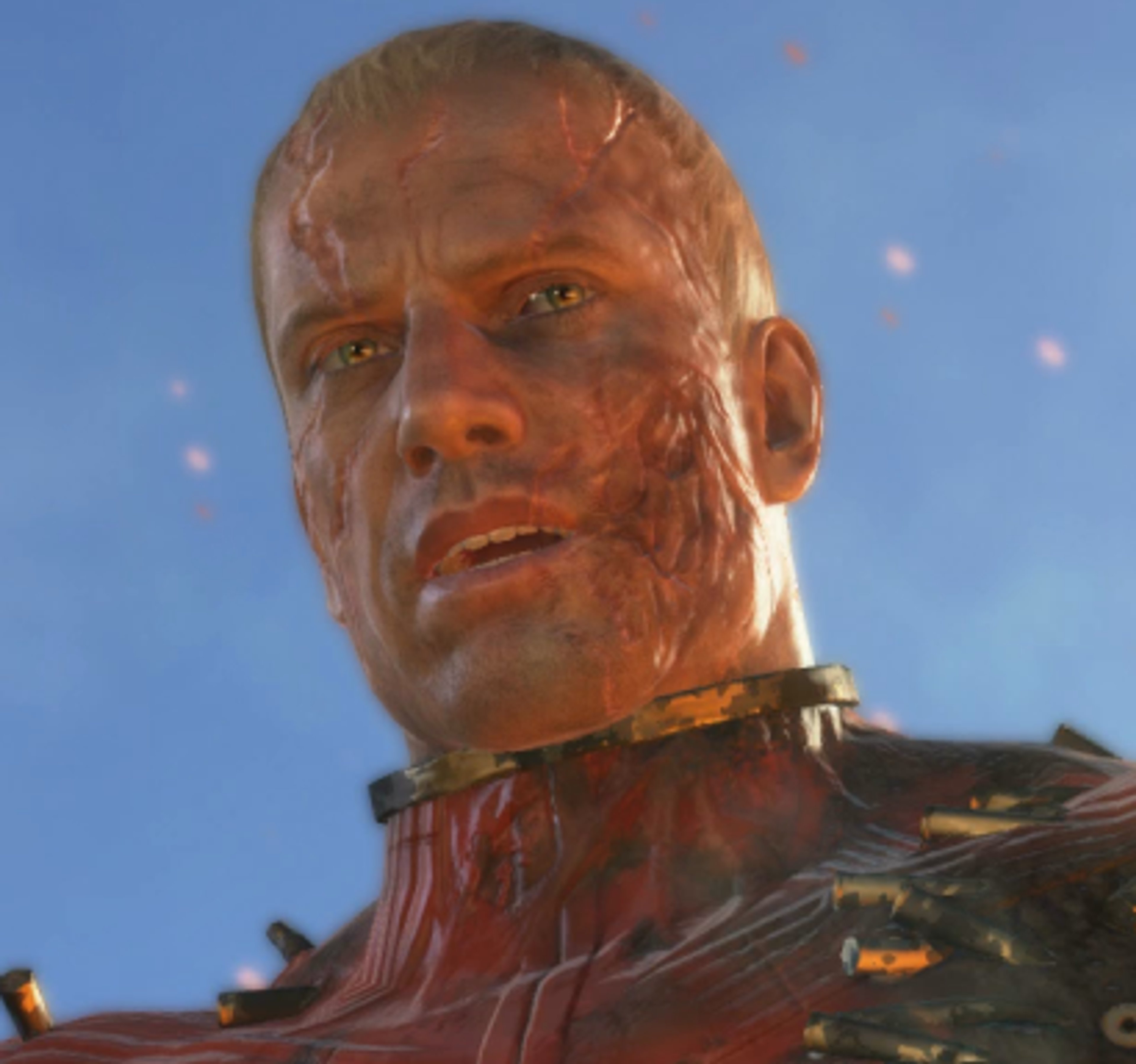 A middle-aged, muscular man with a shaved head and intense expression, wearing a military uniform