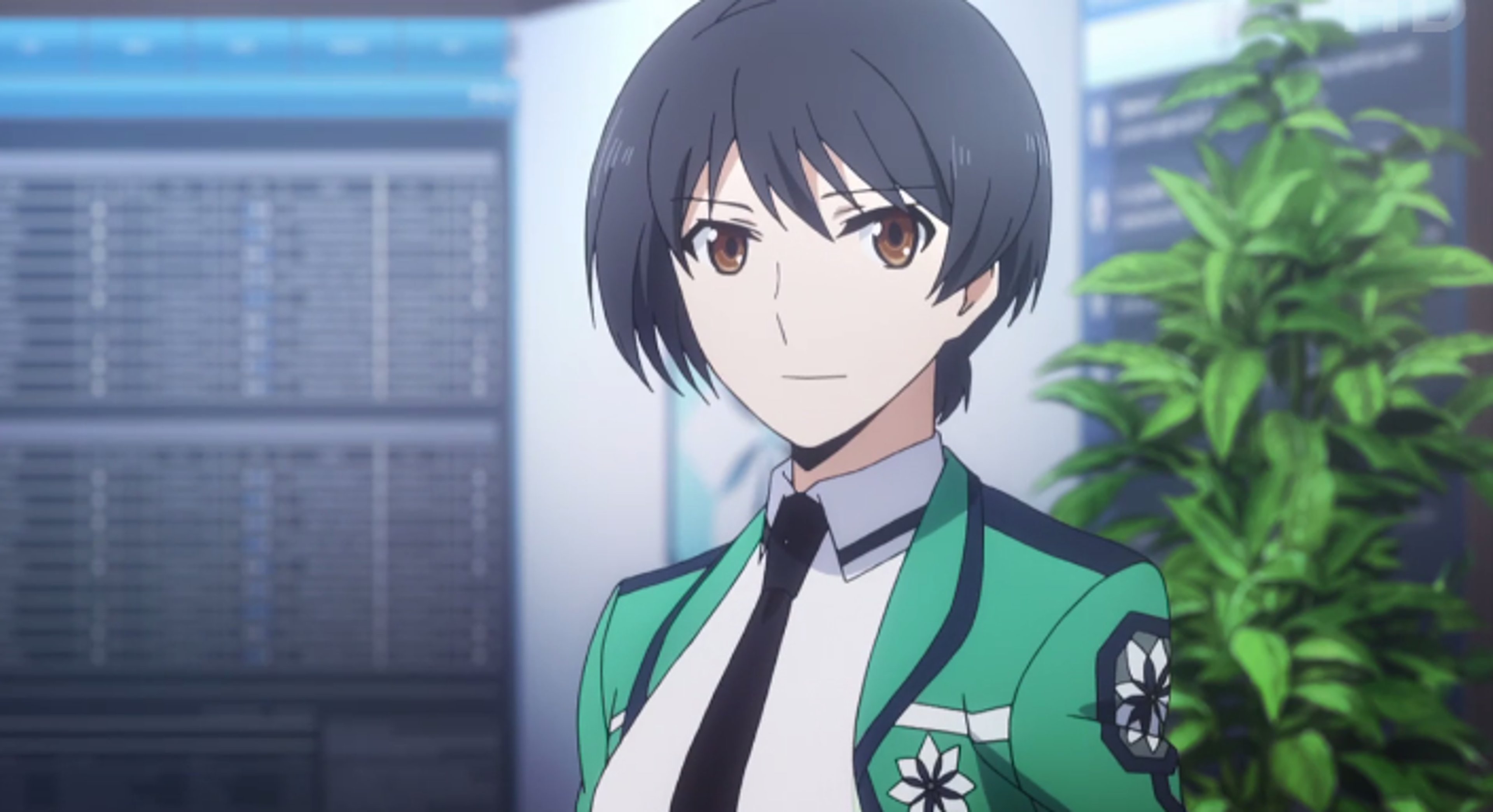 A young woman with short black hair and brown-gold eyes wearing a green uniform with insignia