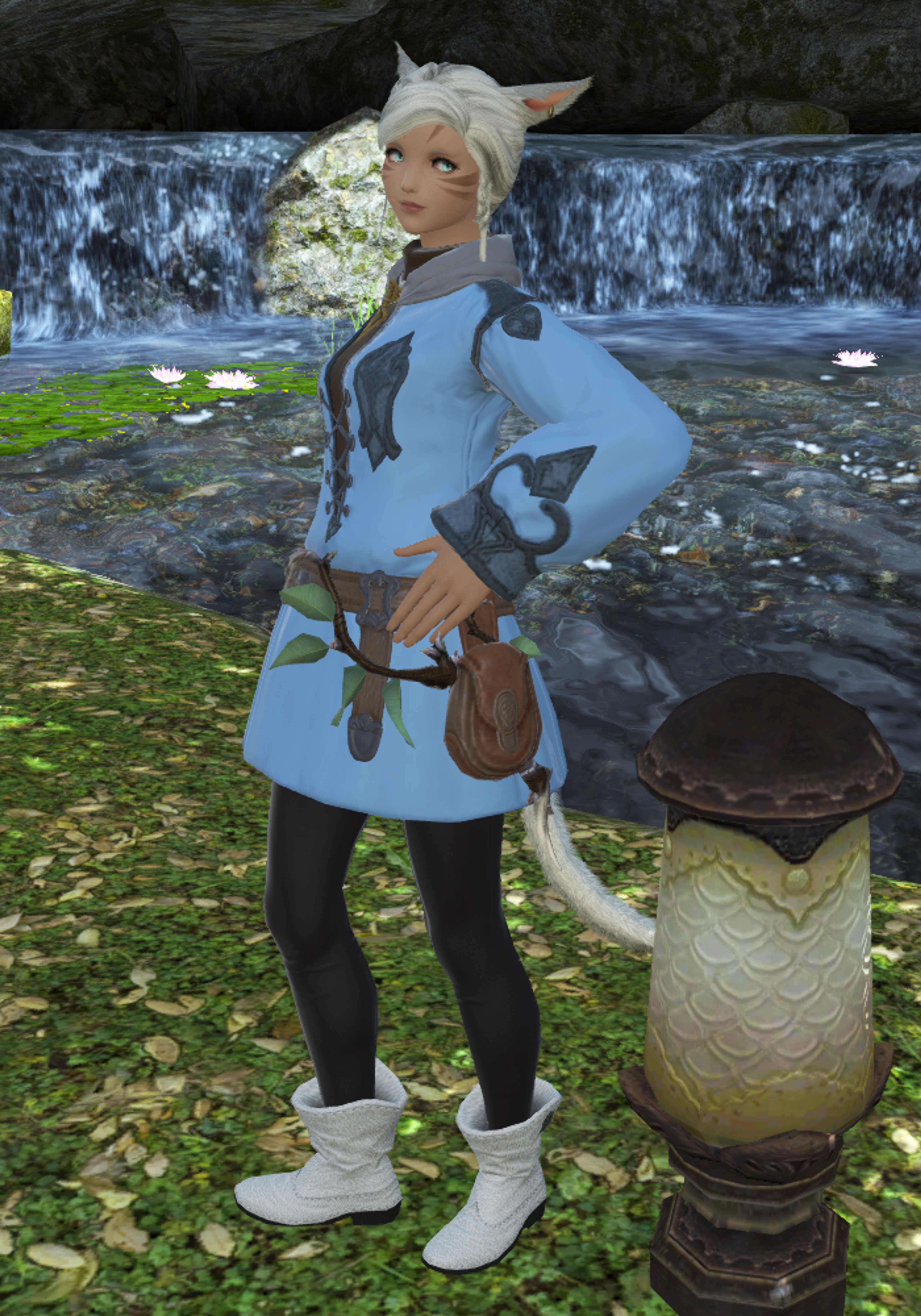 A female Miqo'te character standing in a forest setting