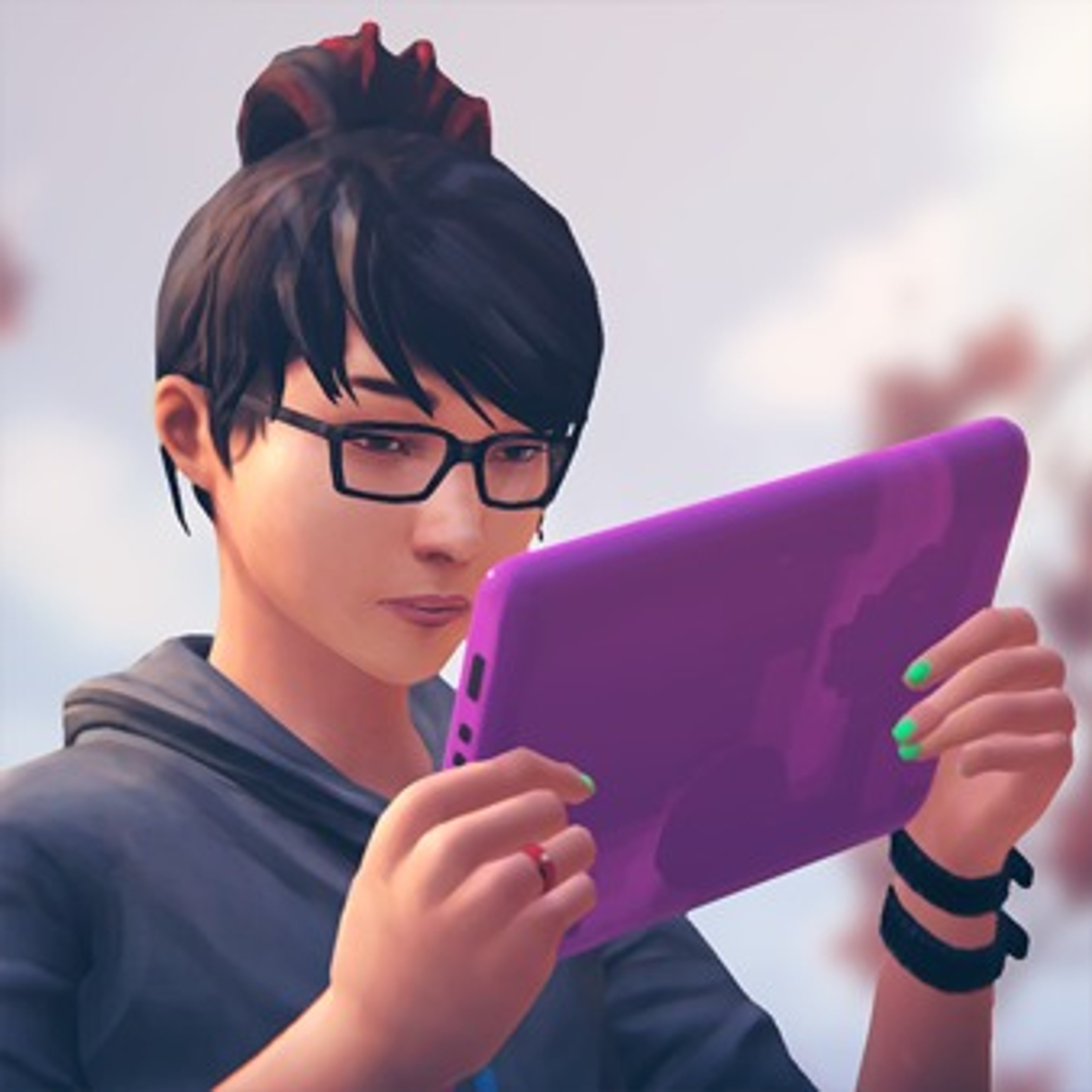 A young woman with black hair and colored highlights wearing glasses and a Star Wars hoodie, holding a purple tablet or device.