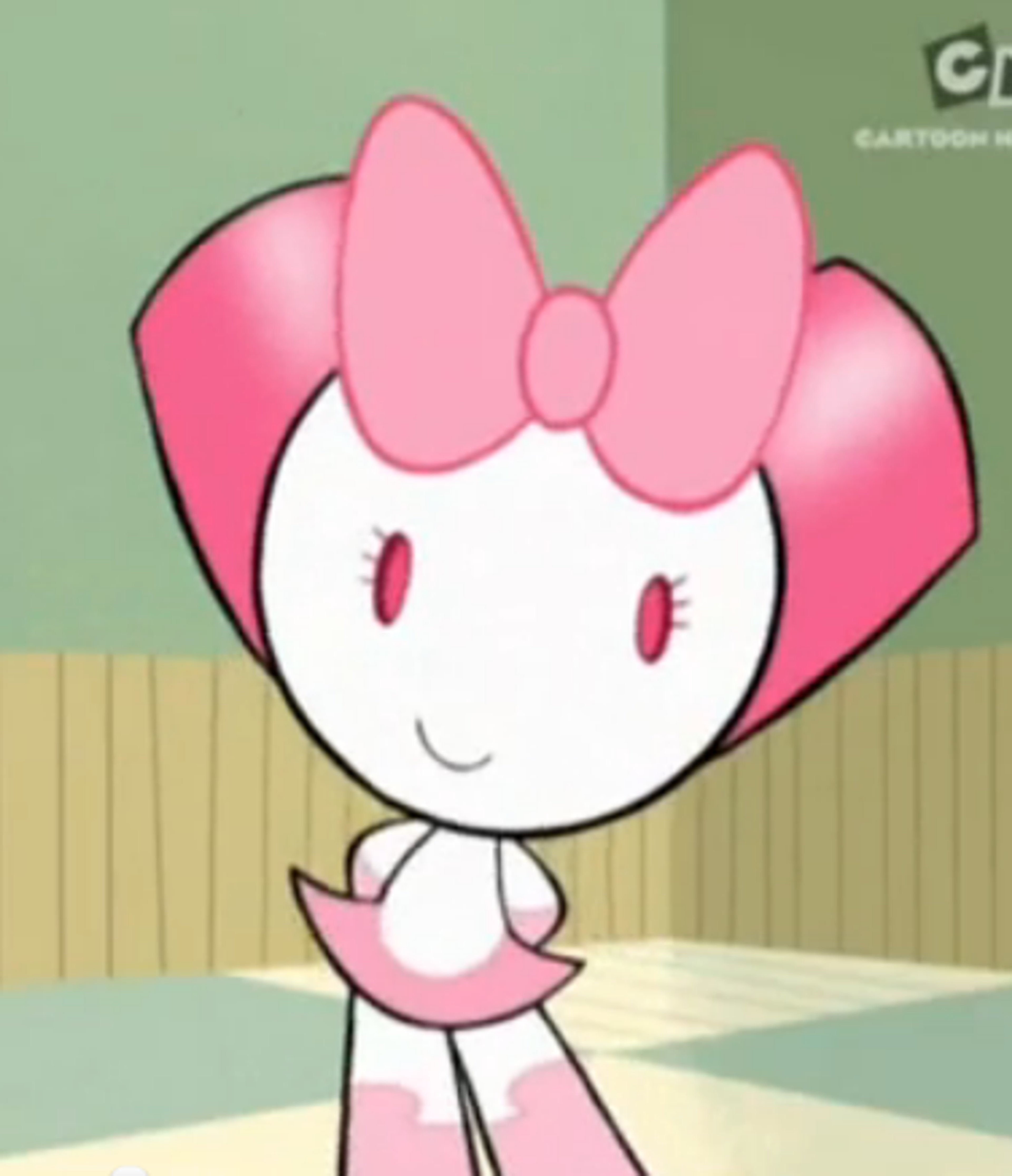 A pink and white cartoon robot character with a bow on her head