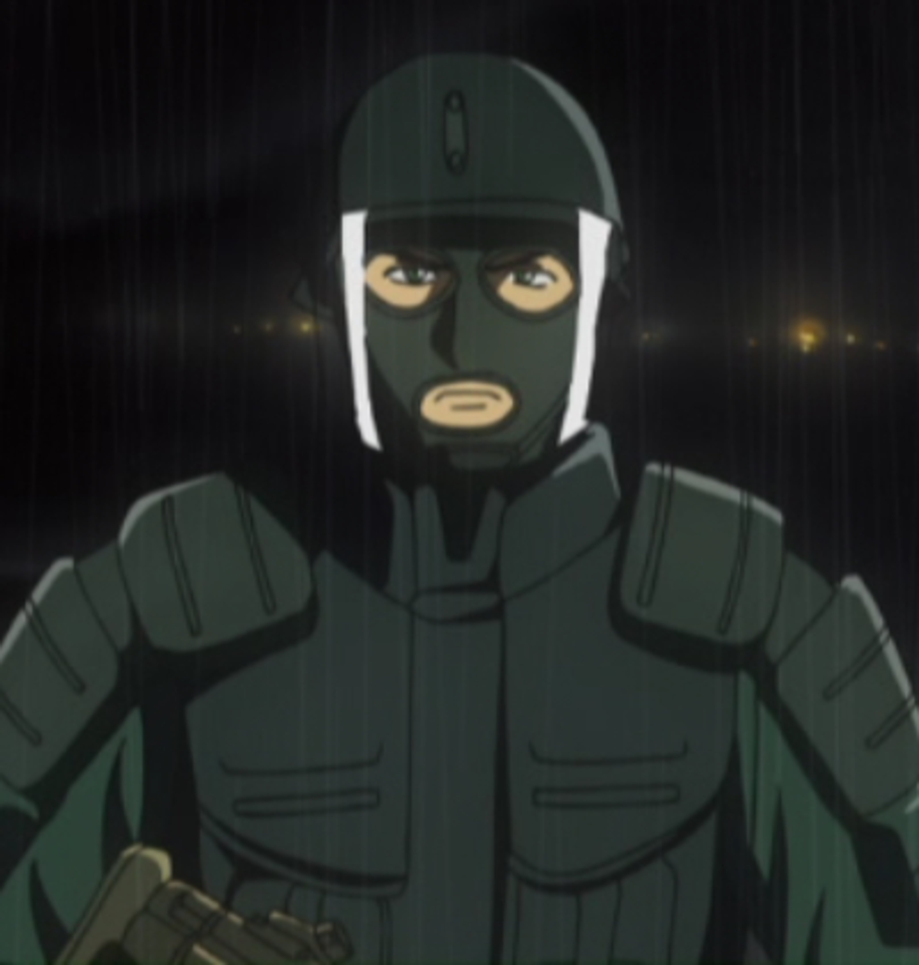 A man in a dark green military uniform with a black mask covering his face