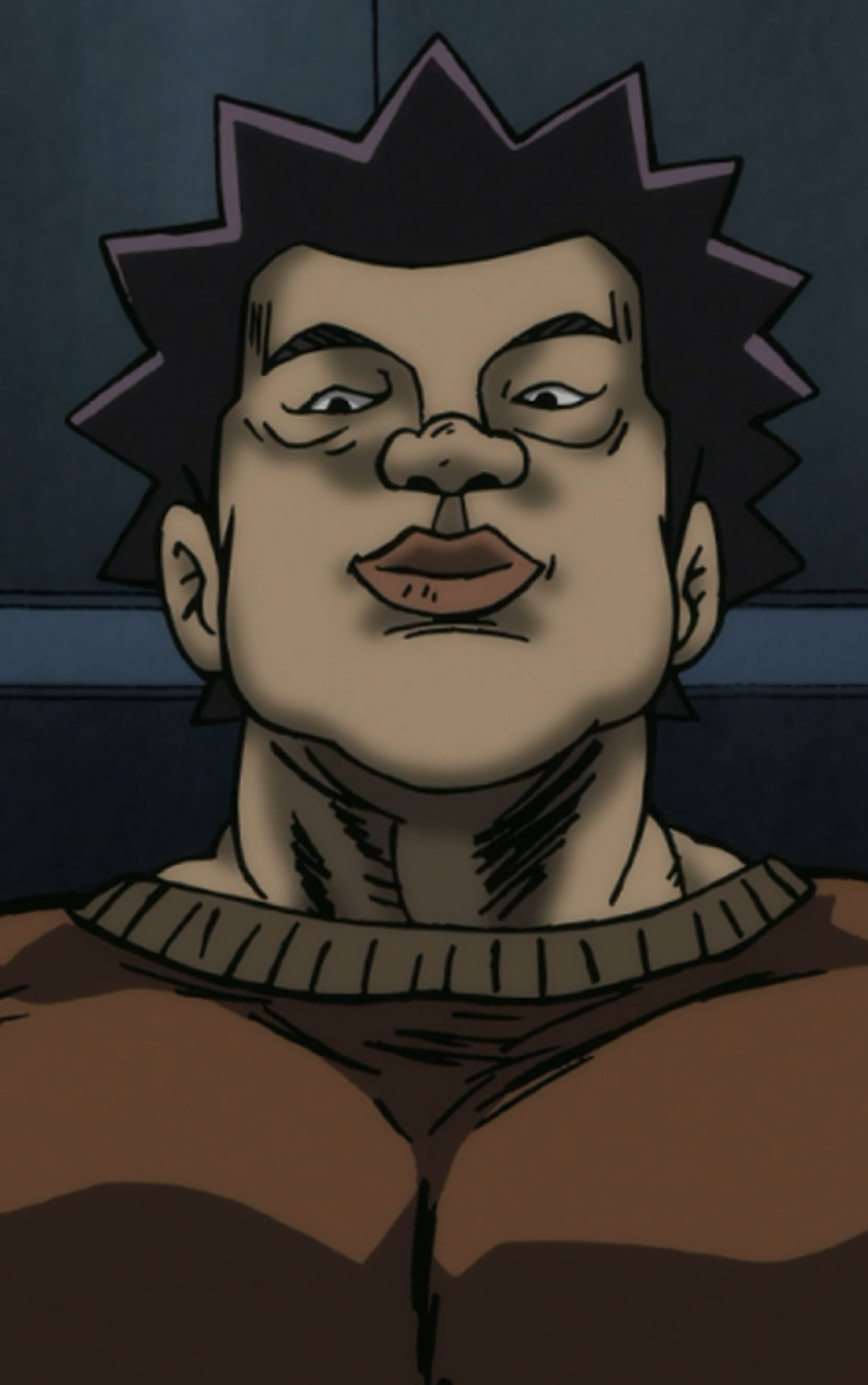 A muscular, bald-headed man with a stern expression