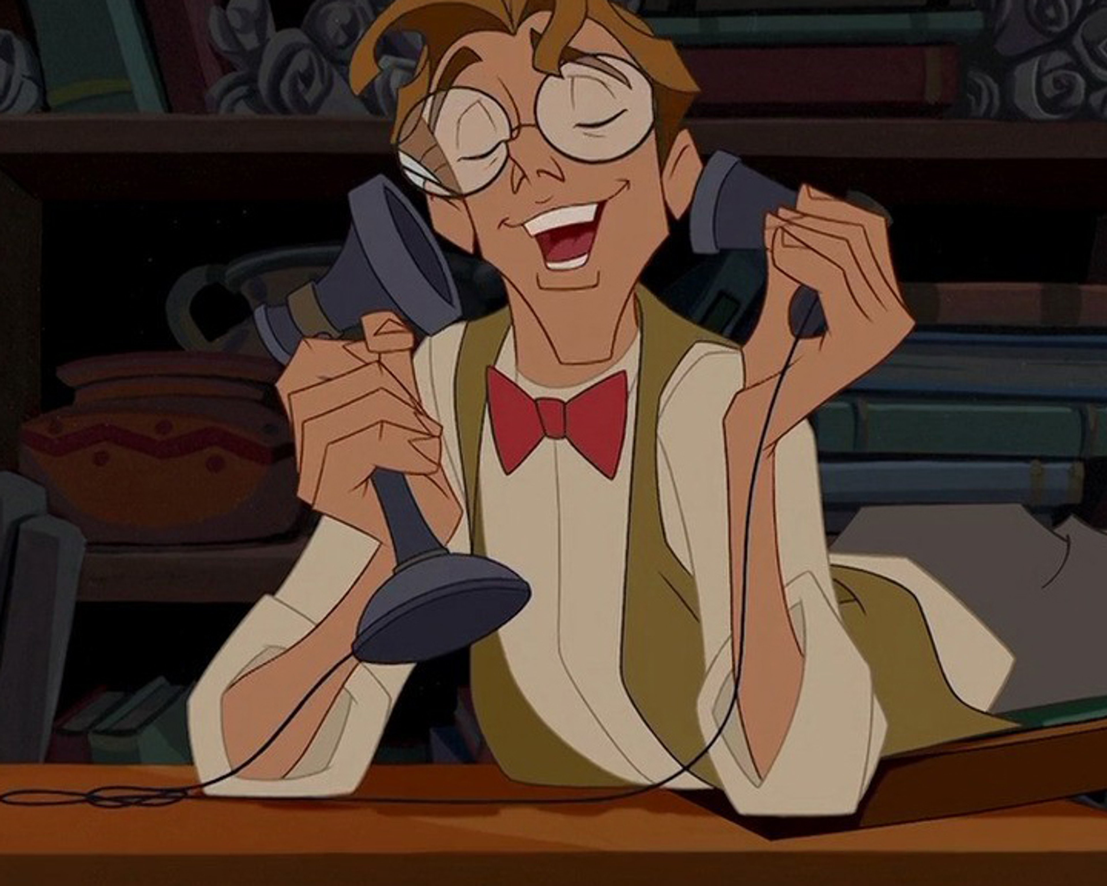 An animated character with glasses, a bow tie, and an excited expression