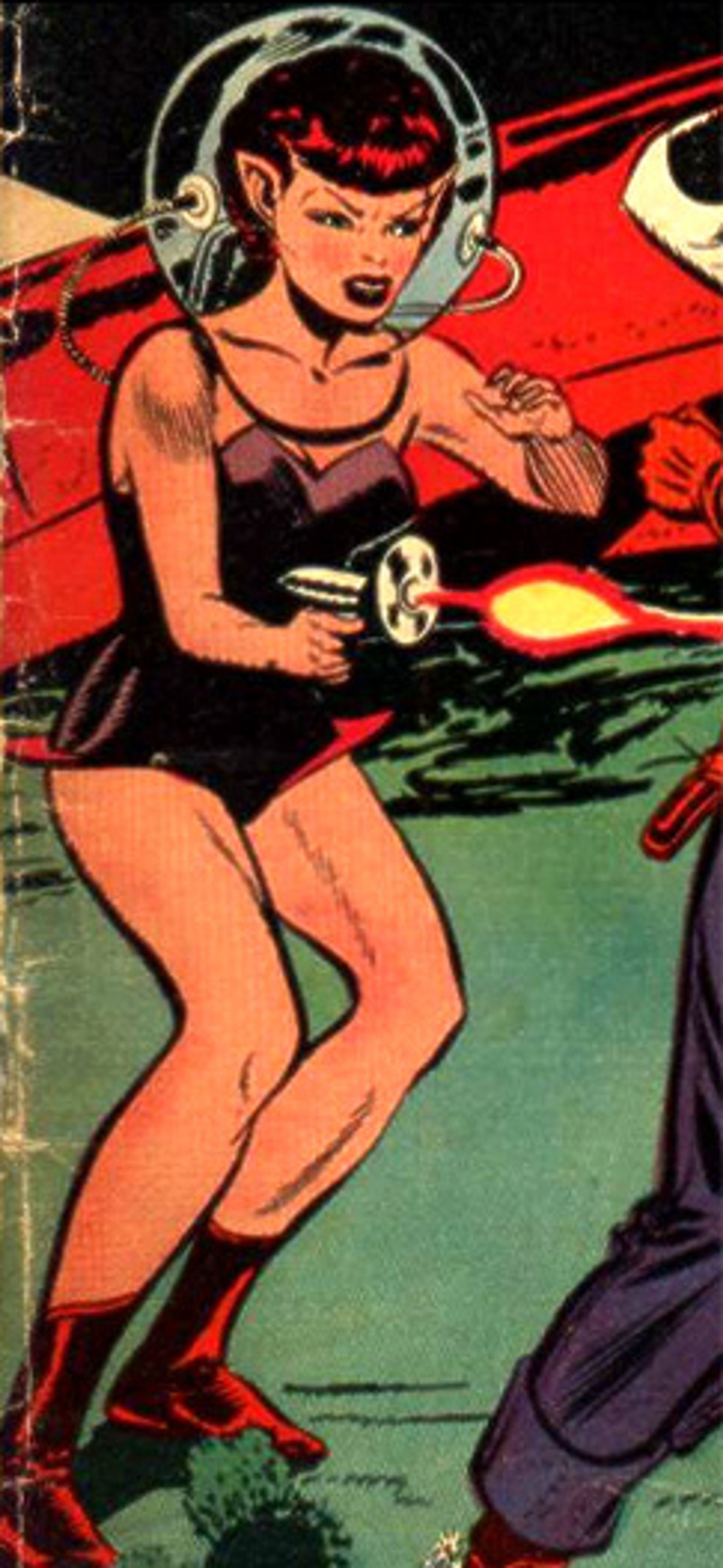 A woman in a red and black outfit in a science fiction setting