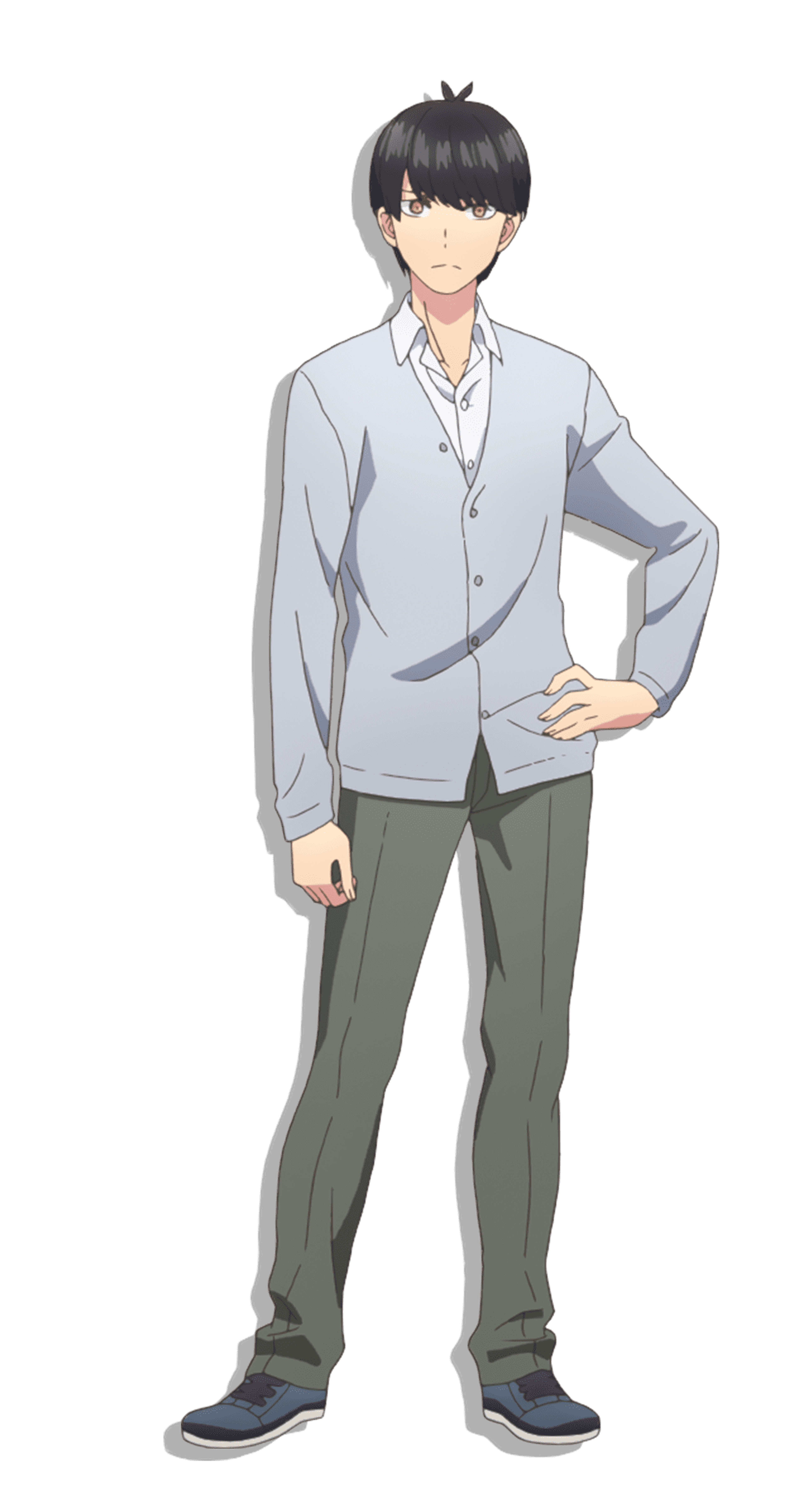 A young man in a gray suit standing with a serious expression