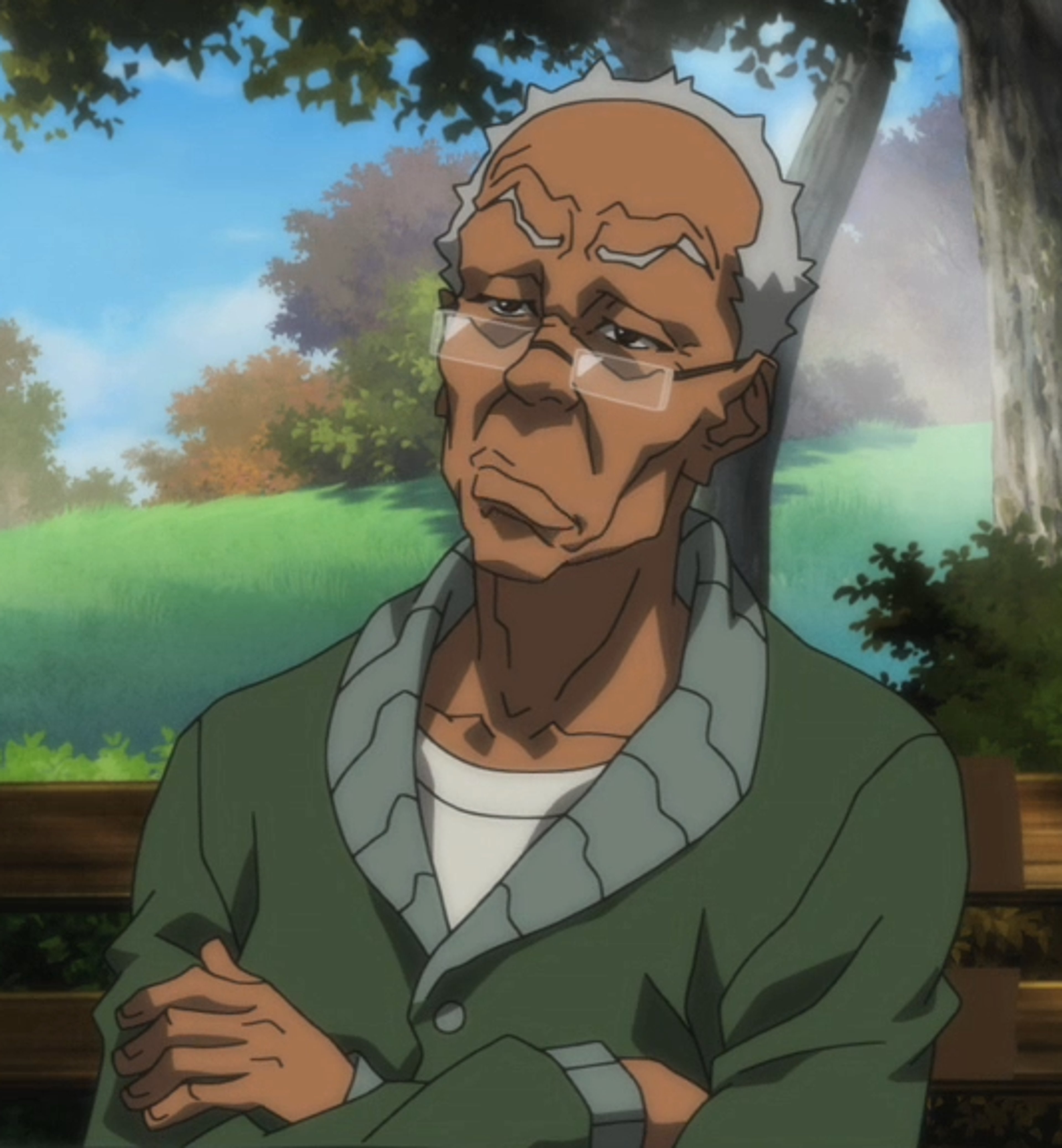An elderly African American man with a stern expression, wearing a green jacket in a park-like setting.