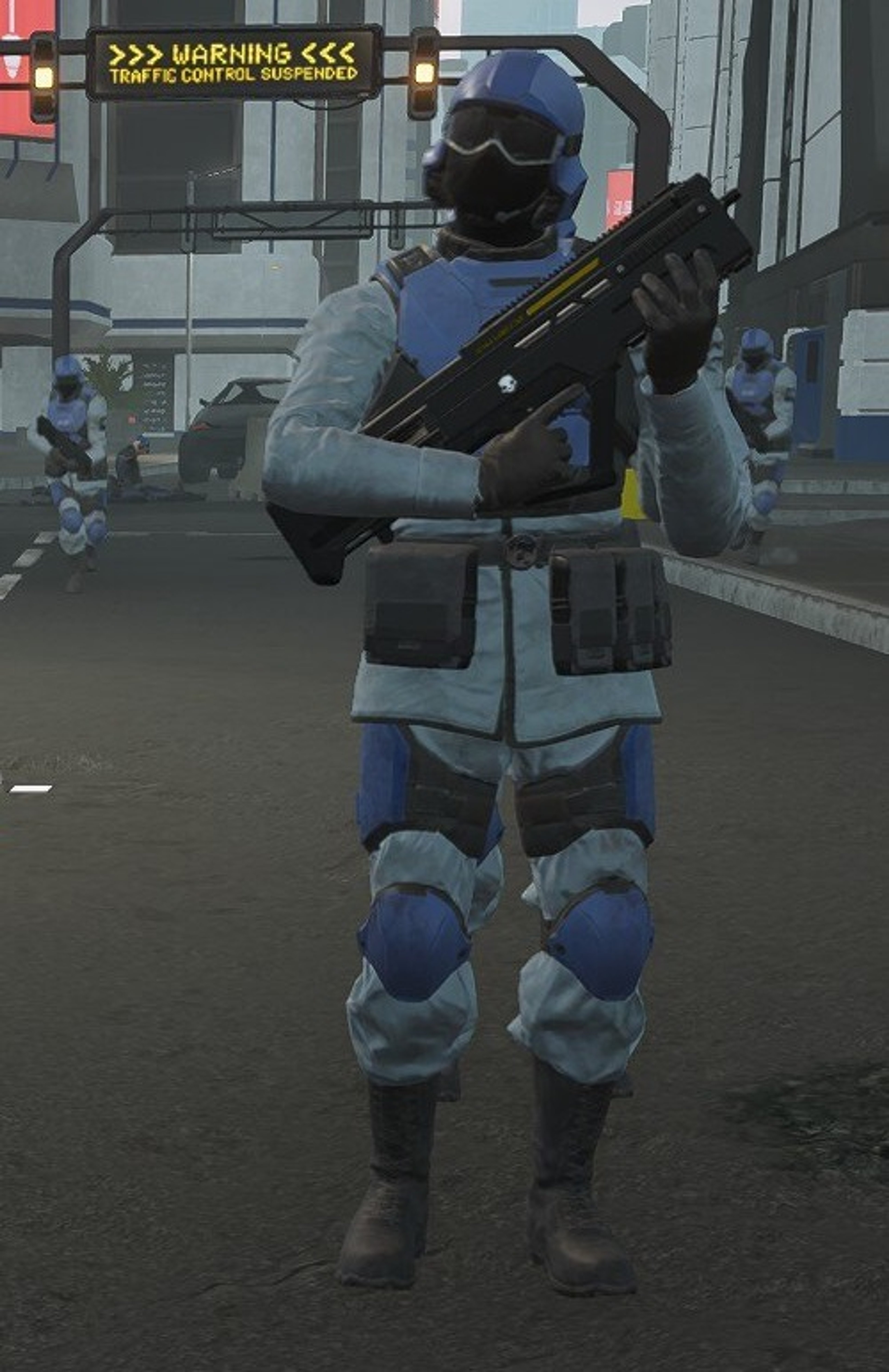 A heavily armed and armored soldier in blue combat gear, holding an assault rifle in an urban setting.