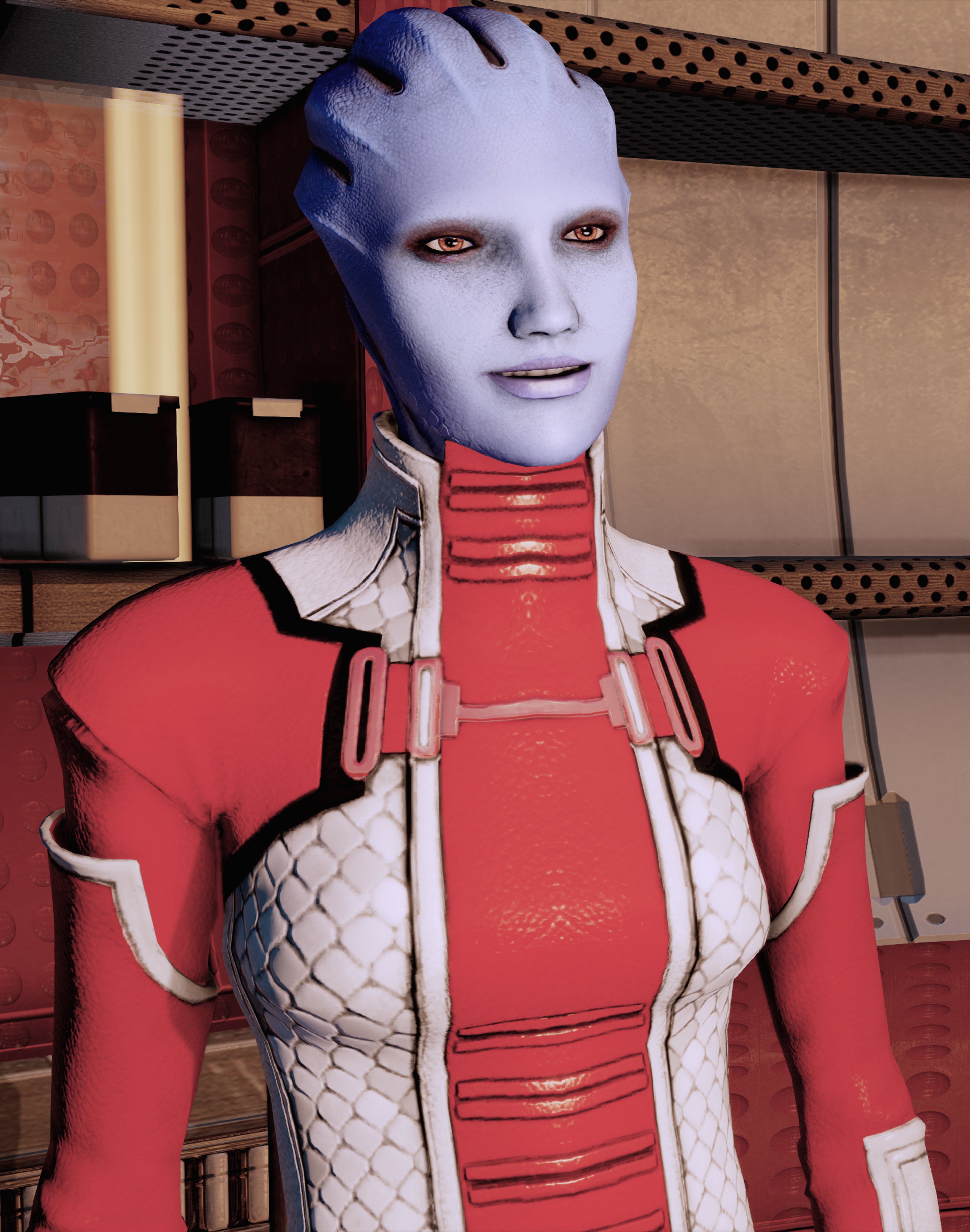 An asari character with blue skin and a red and white outfit, in a combat-ready pose.