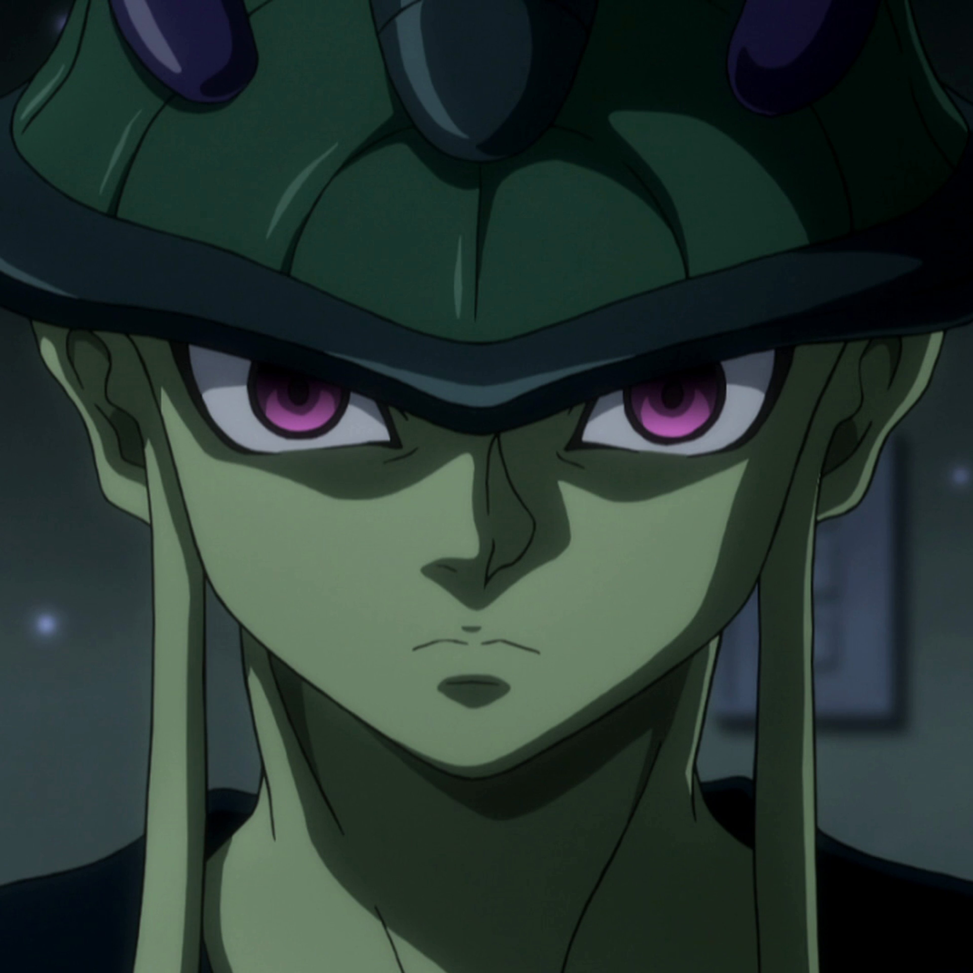 A powerful, green-skinned humanoid figure with a stern, intense expression