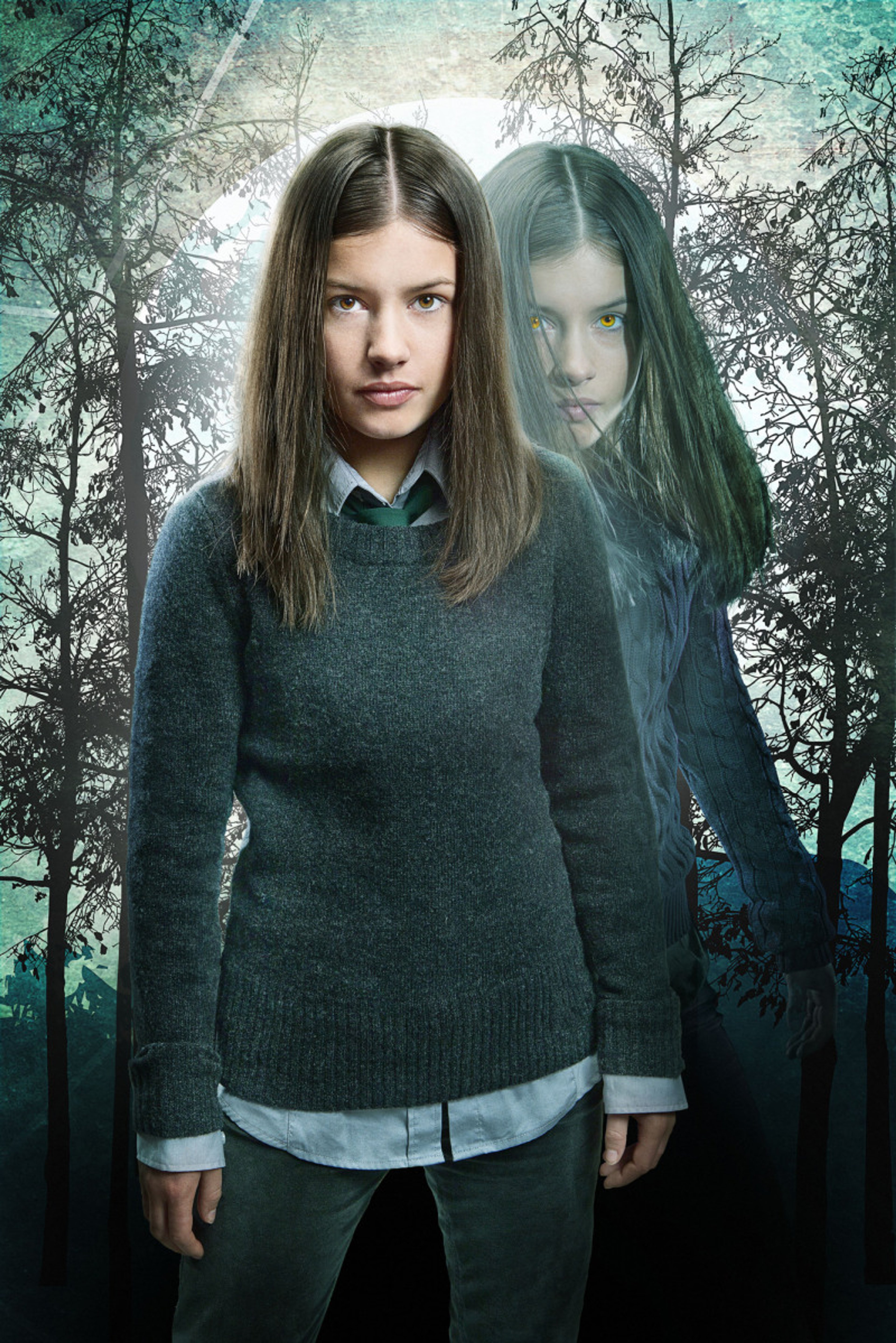 Two young women standing in a forest