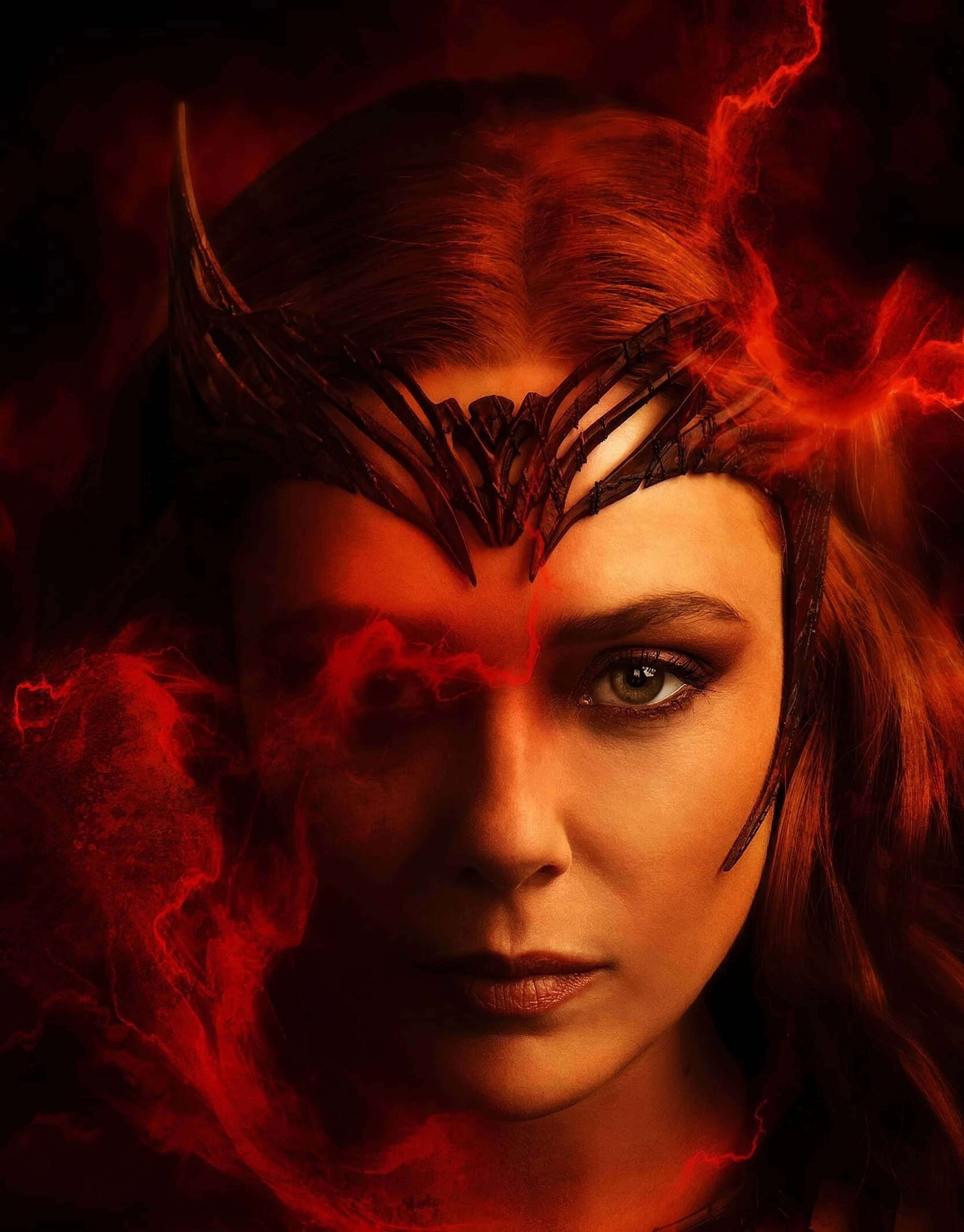 A woman with red hair and a red costume using magical energy