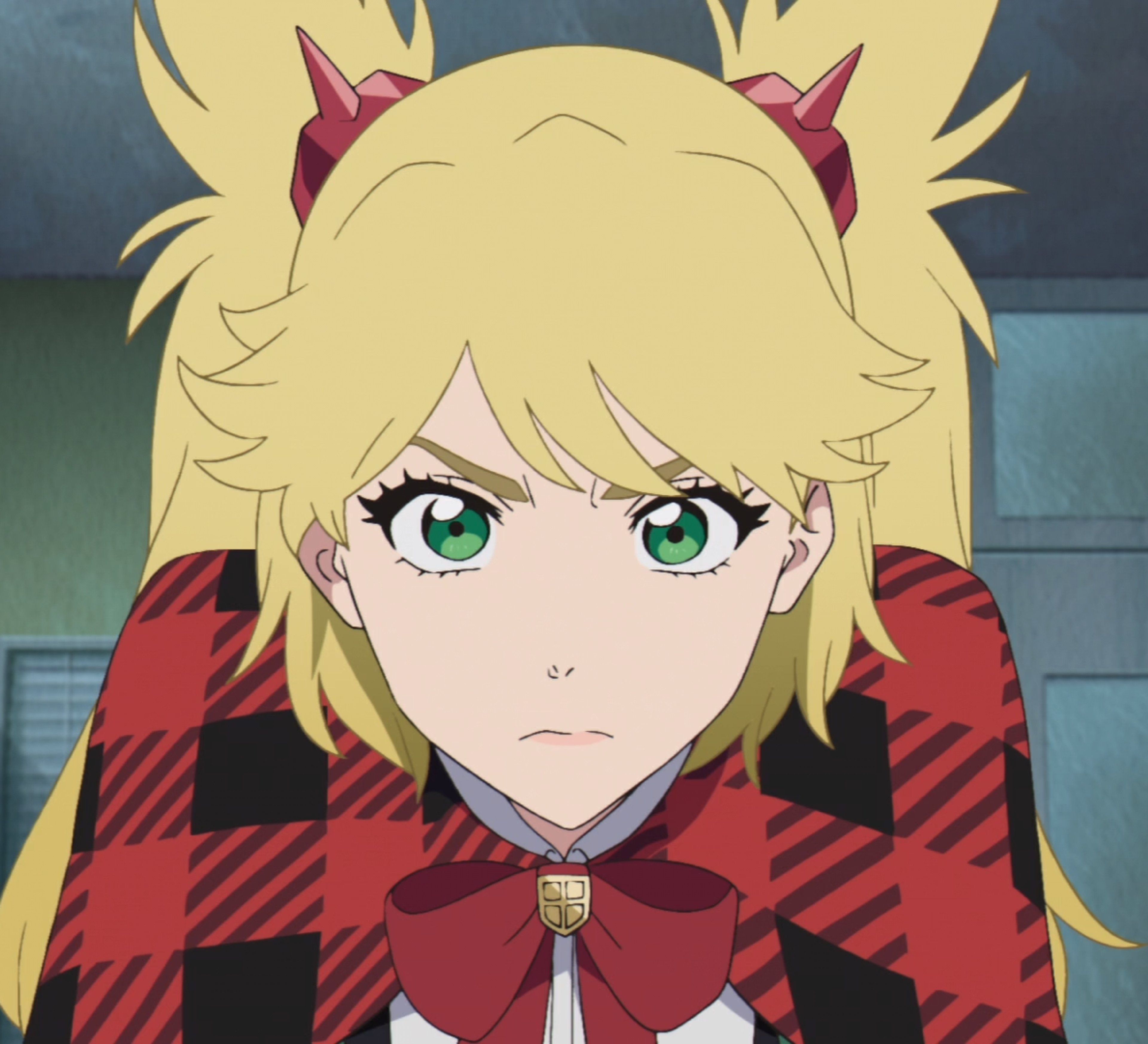 An anime-style character with blonde pigtails wearing a green suit and plaid cape