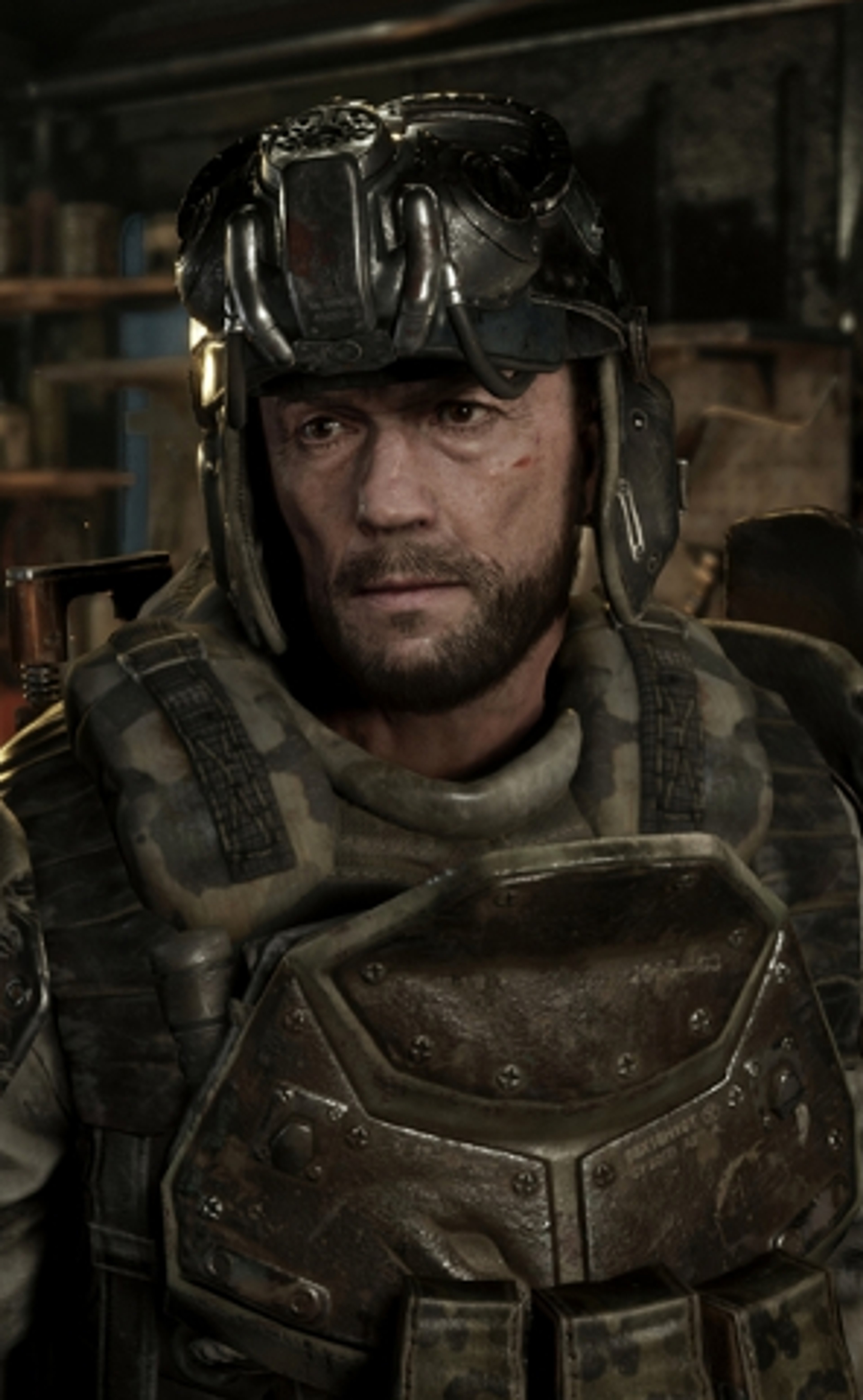 A man in military gear with a serious expression