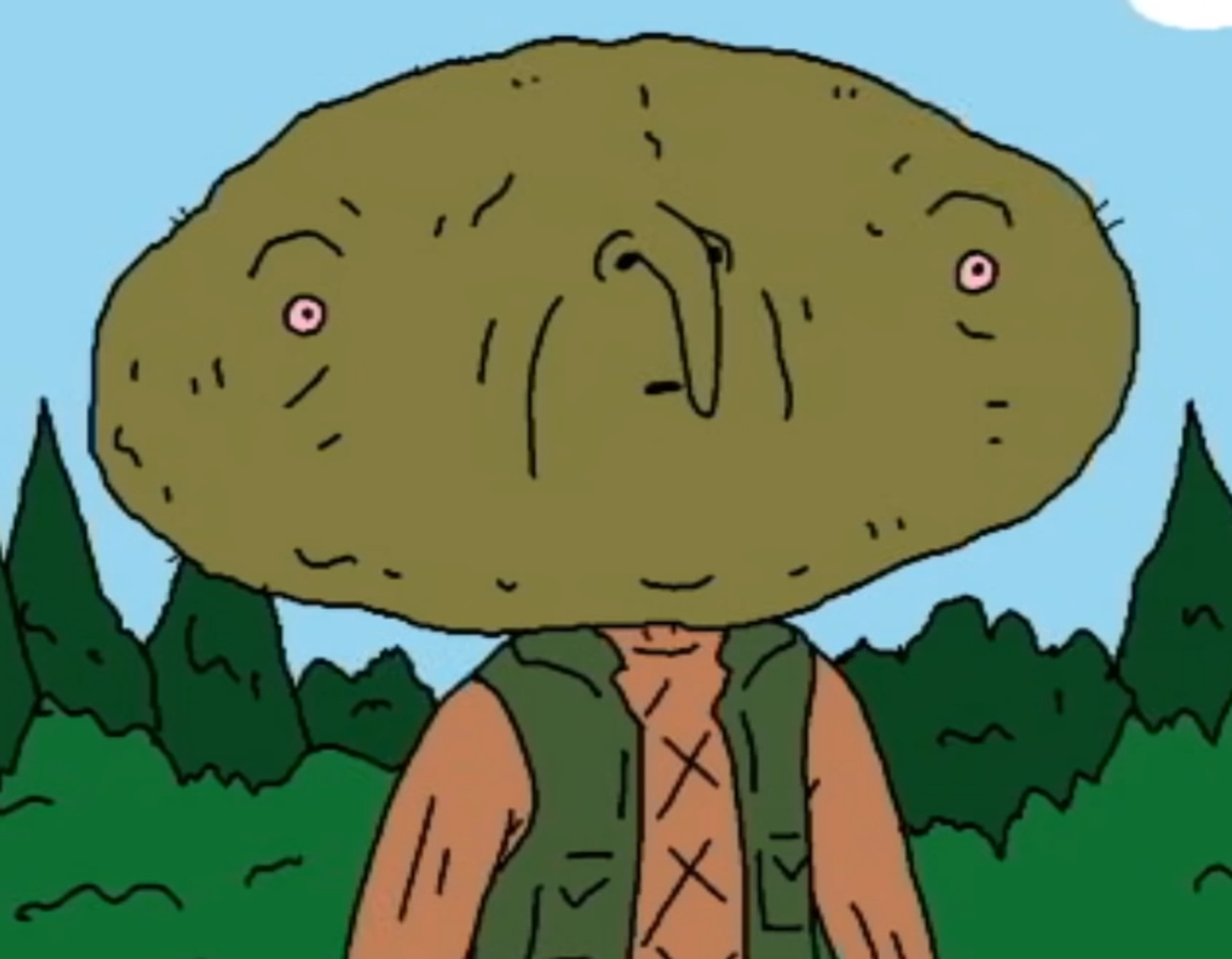 A character with a large, potato-like head and expressive eyes standing in a forested area