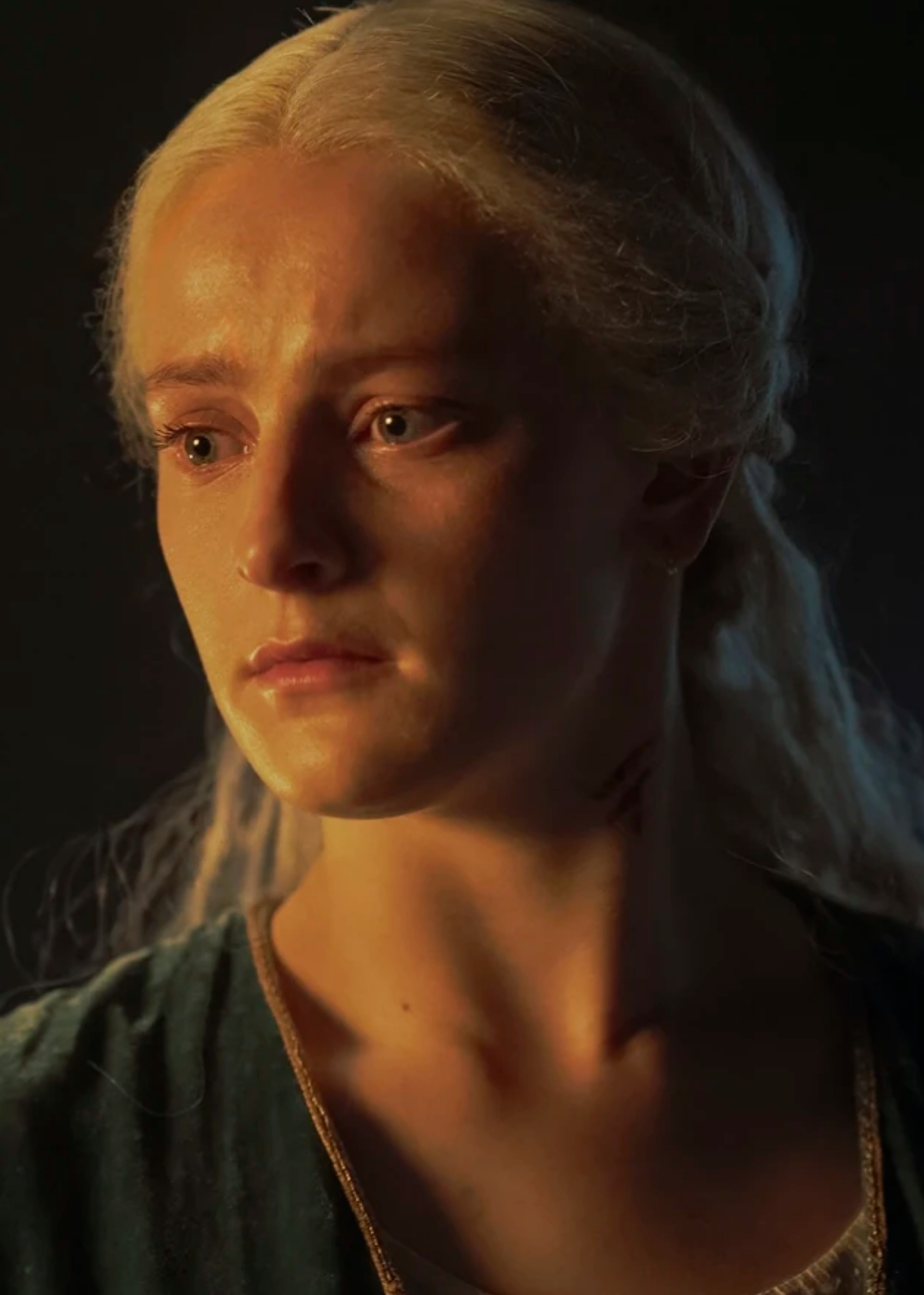 A young woman with silver-gold hair and violet eyes, characteristic of the Targaryen family in the Westeros universe.