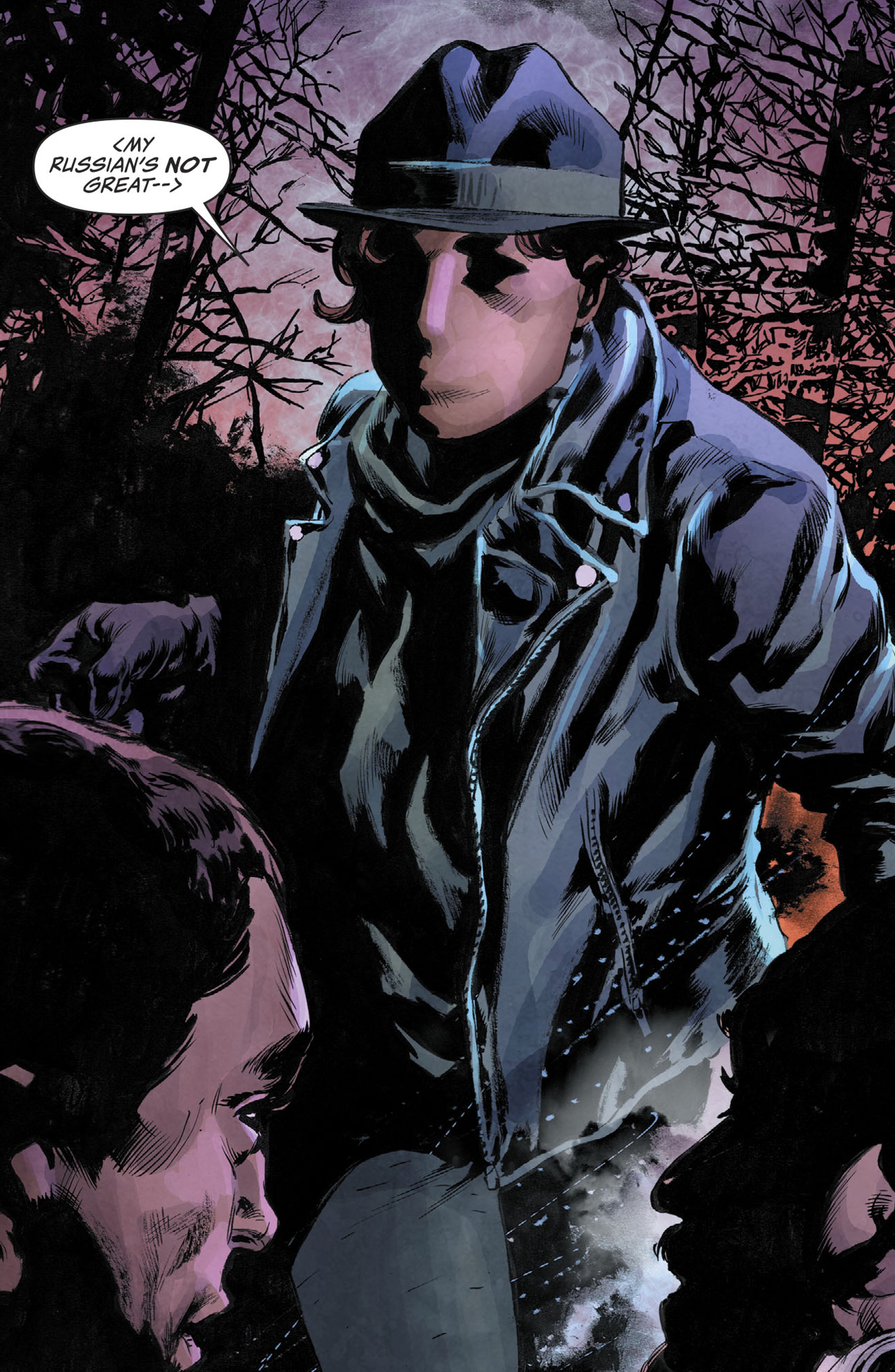 A woman in a dark coat and hat standing in a gritty urban setting, with a serious expression on her face.