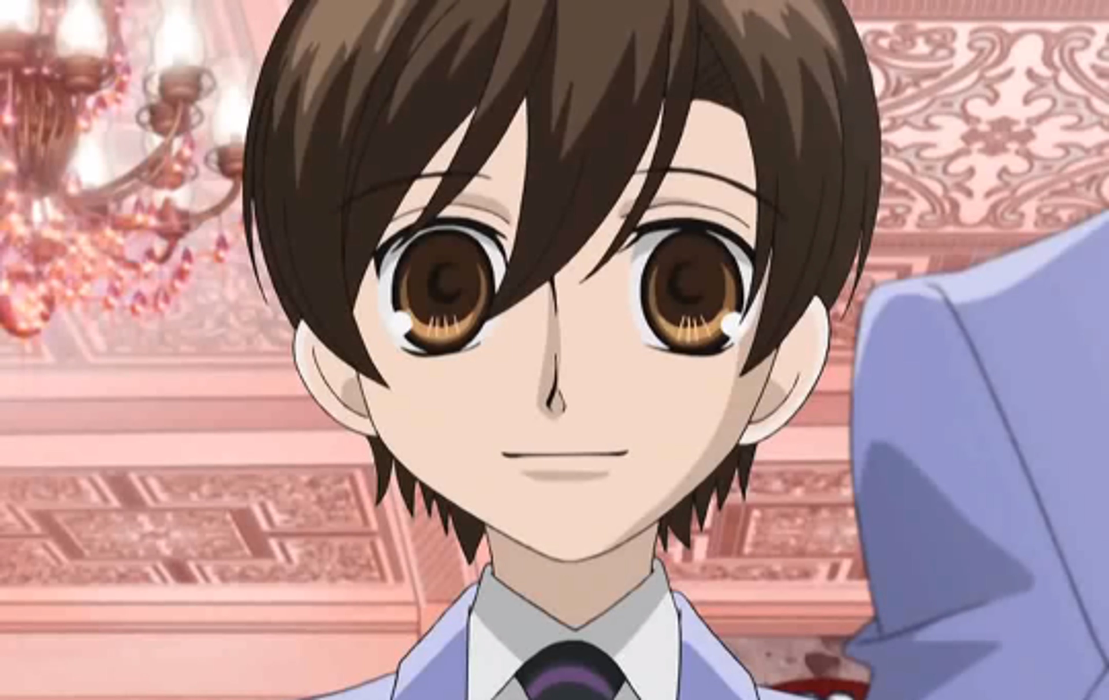 An anime-style character with short dark hair wearing a male school uniform